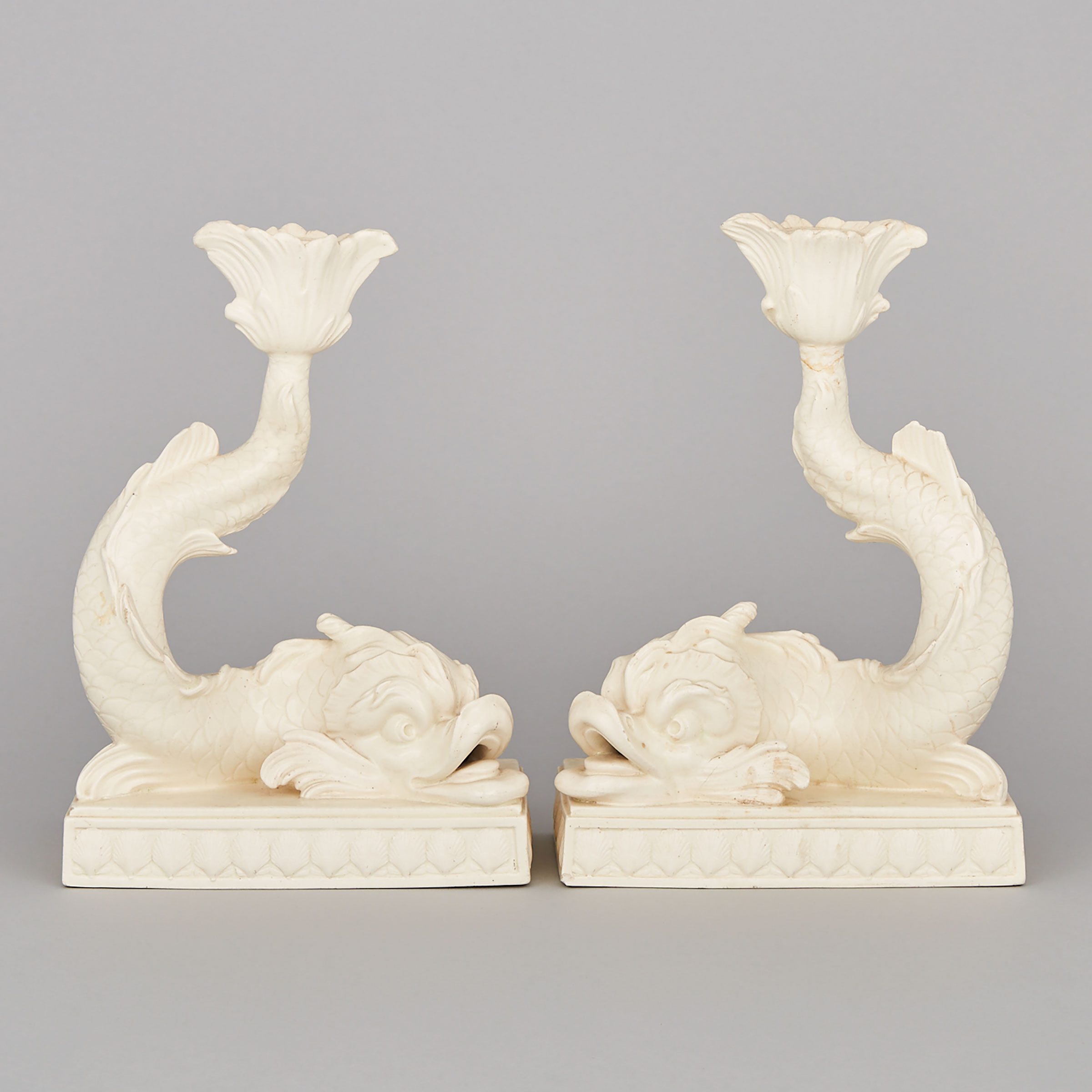 Pair of Wedgwood Queen’s Ware Dolphin Candlesticks, early 20th century