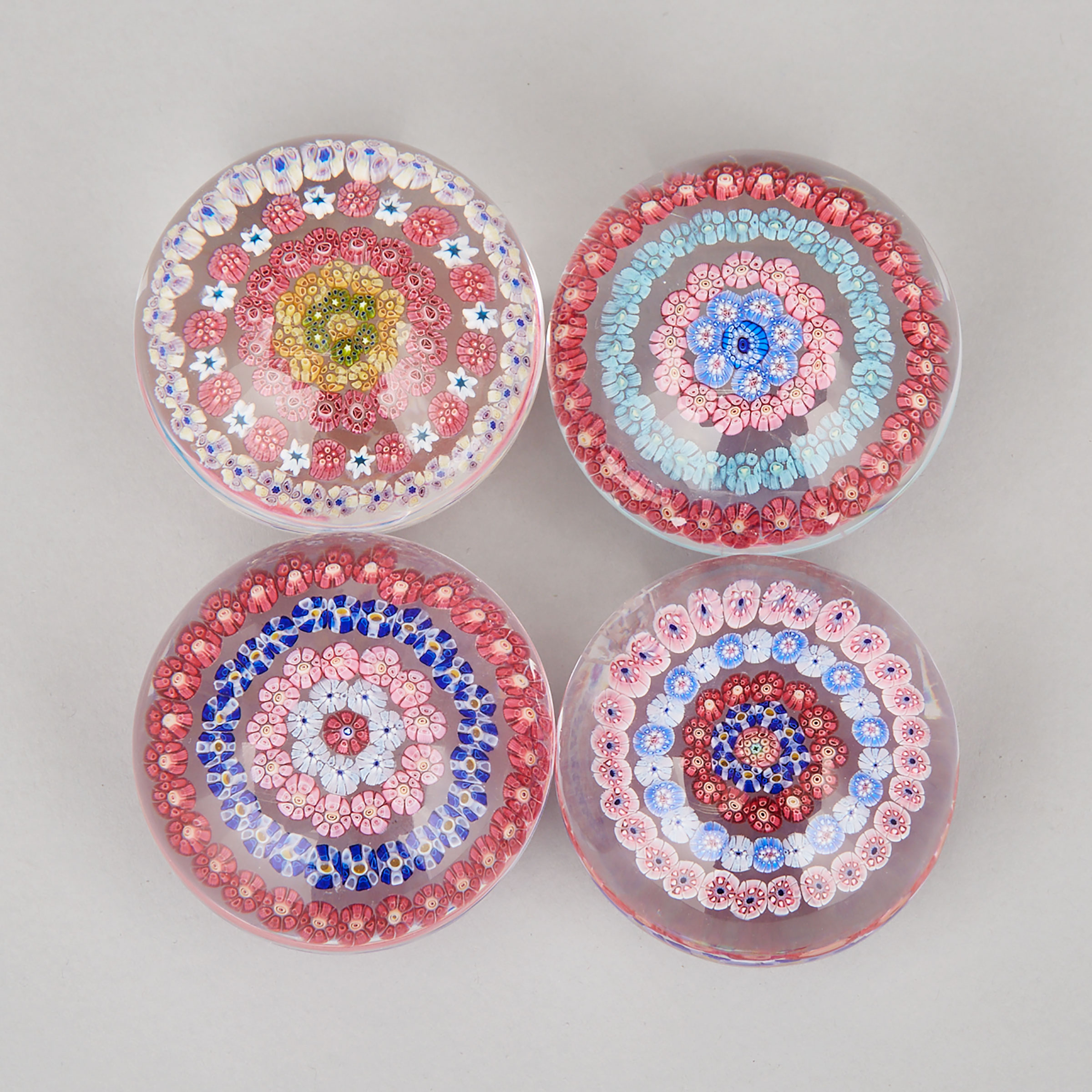 Four Concentric Millefiori Glass Paperweights, 20th century