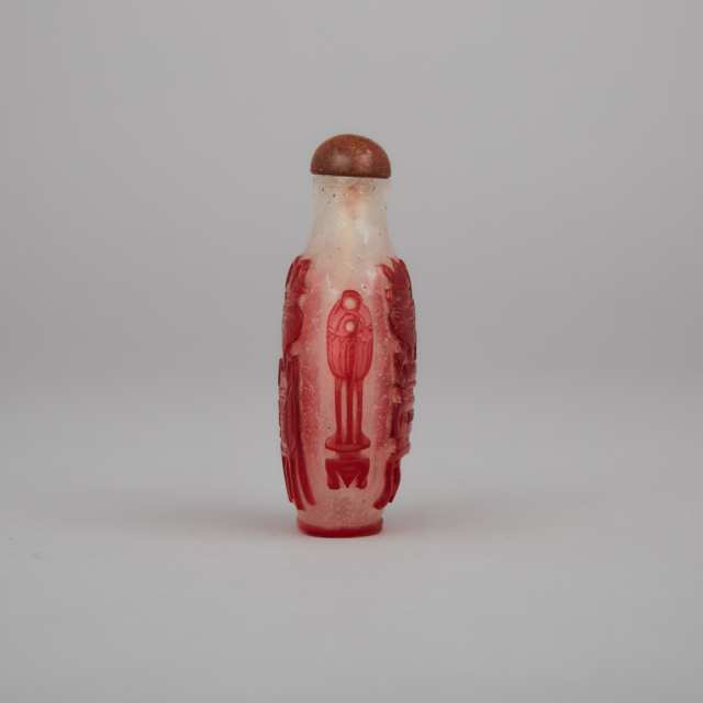 A Red-Overlay ‘Precious Objects’ Peking Glass Snuff Bottle, 19th Century