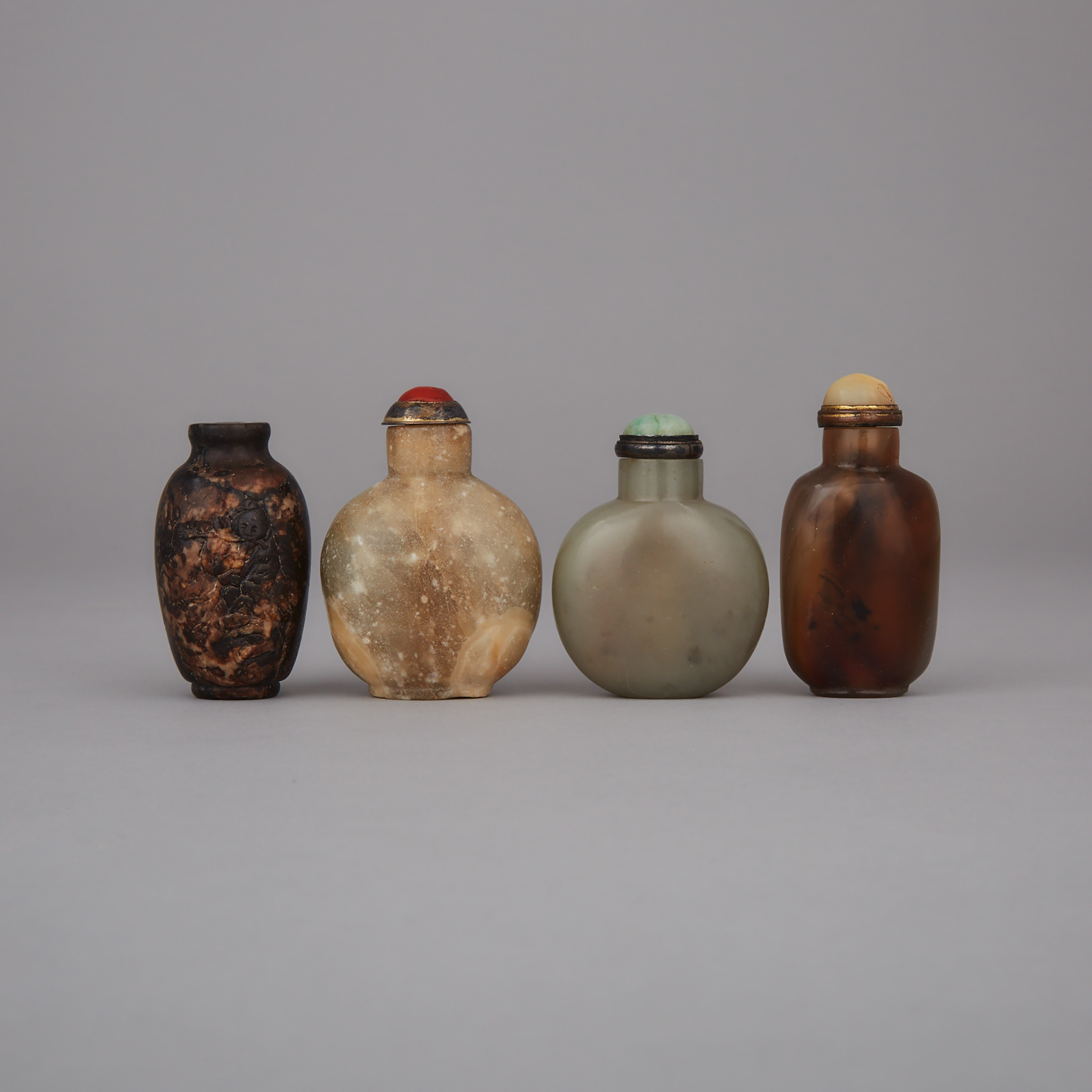 A Group of Four Snuff Bottles, 19th/20th Century