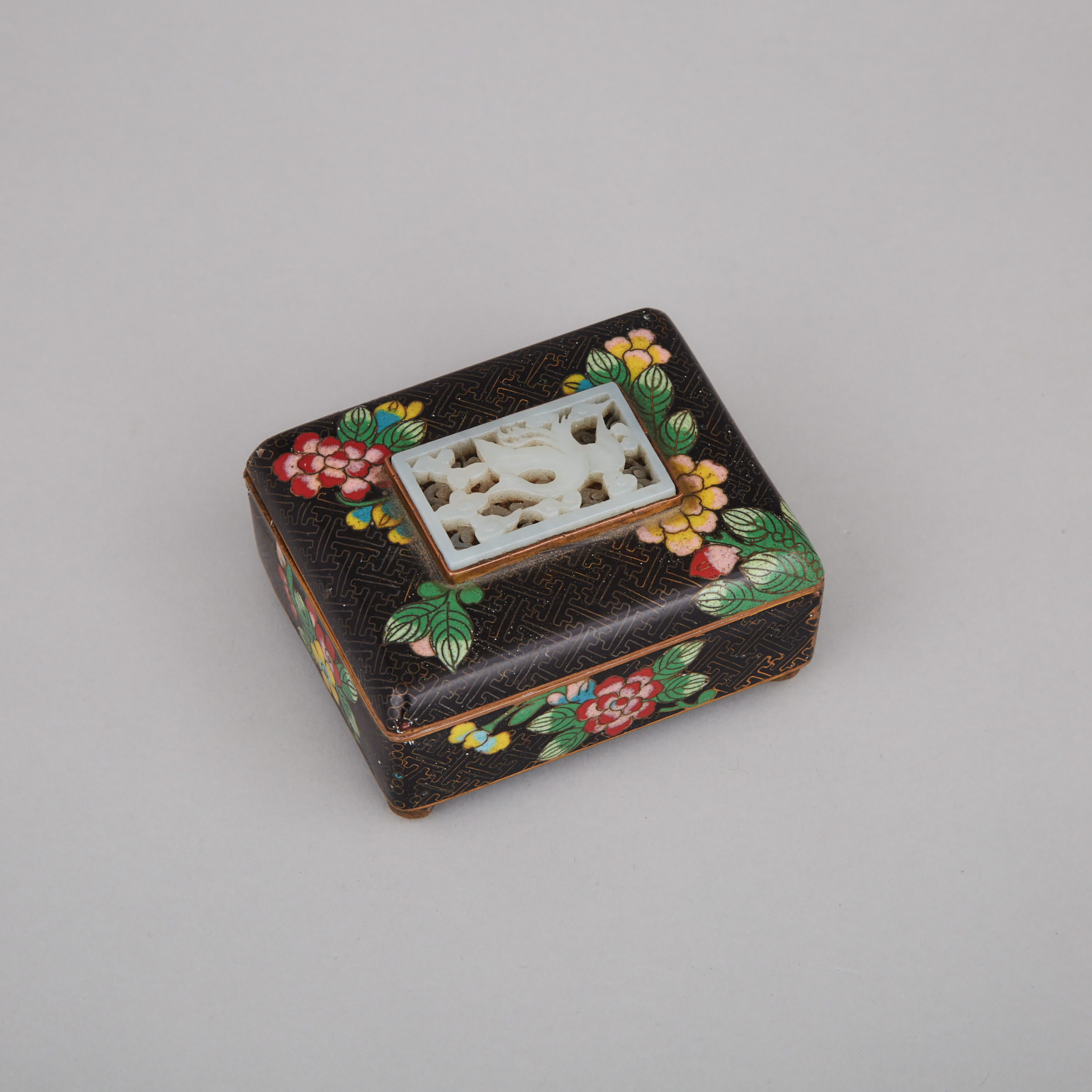 A Reticulated Jade Inlaid Cloisonné Box