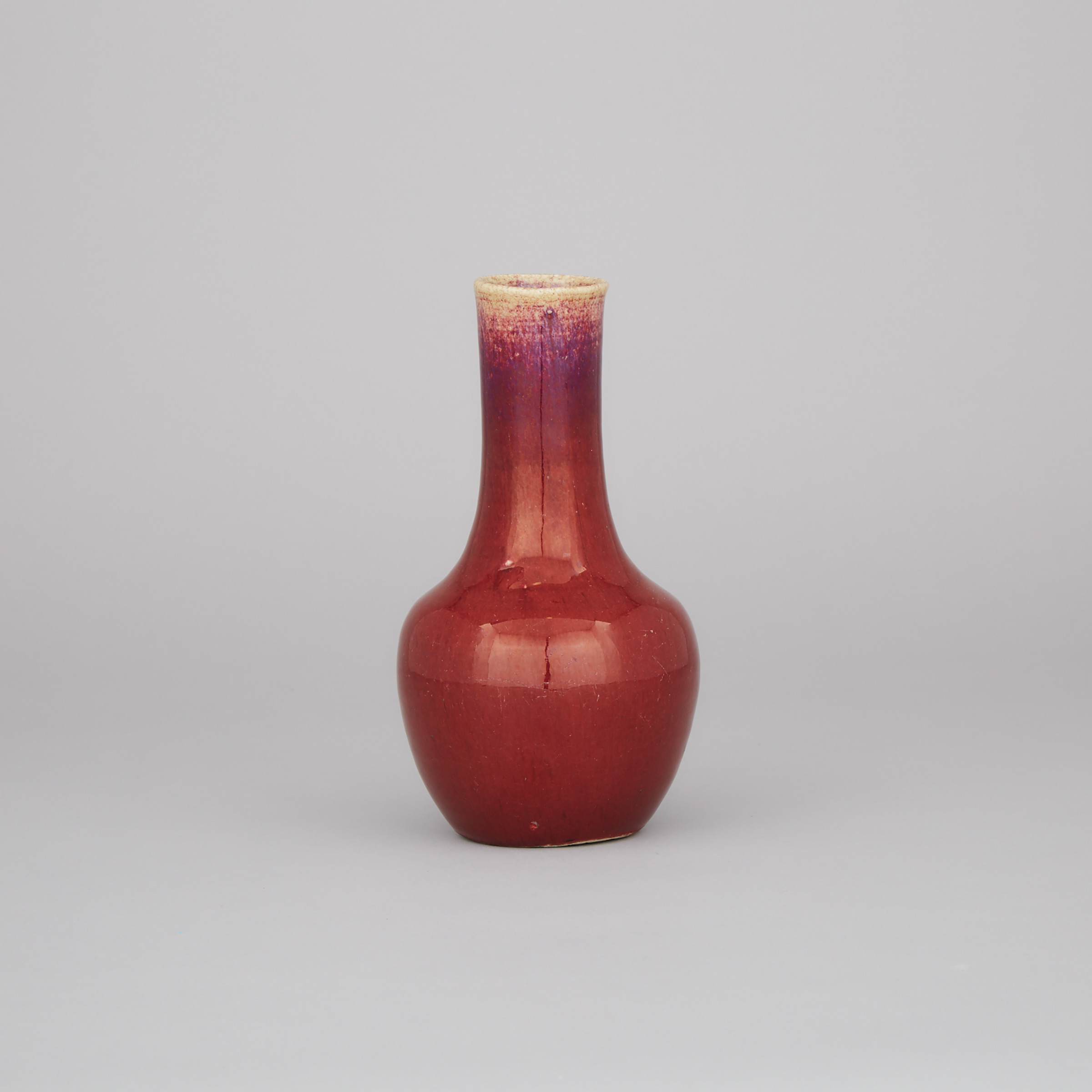A Small Flambé Glazed Bottle Vase, 19th Century