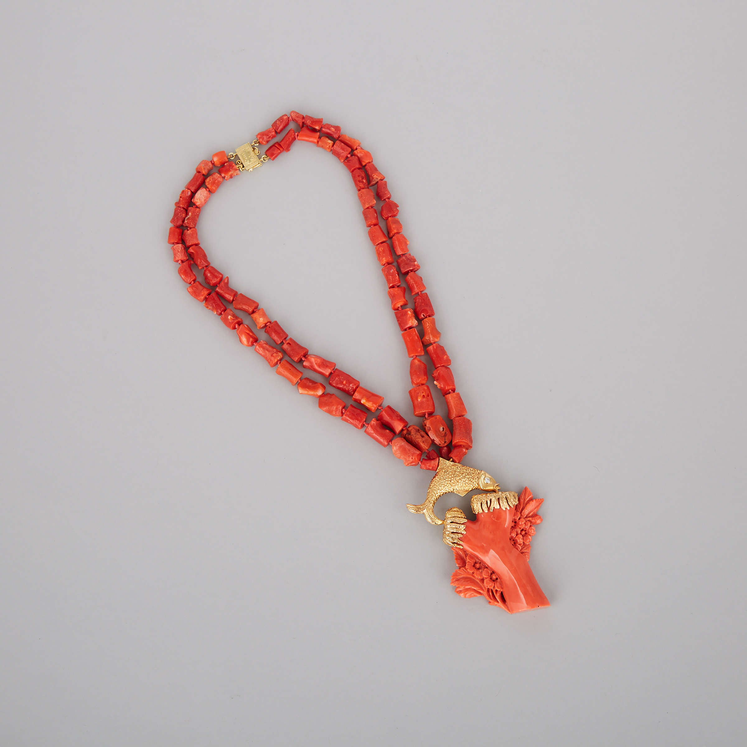 A Pink Coral 14k Gold and Diamond ‘Fish’ Mounted Necklace