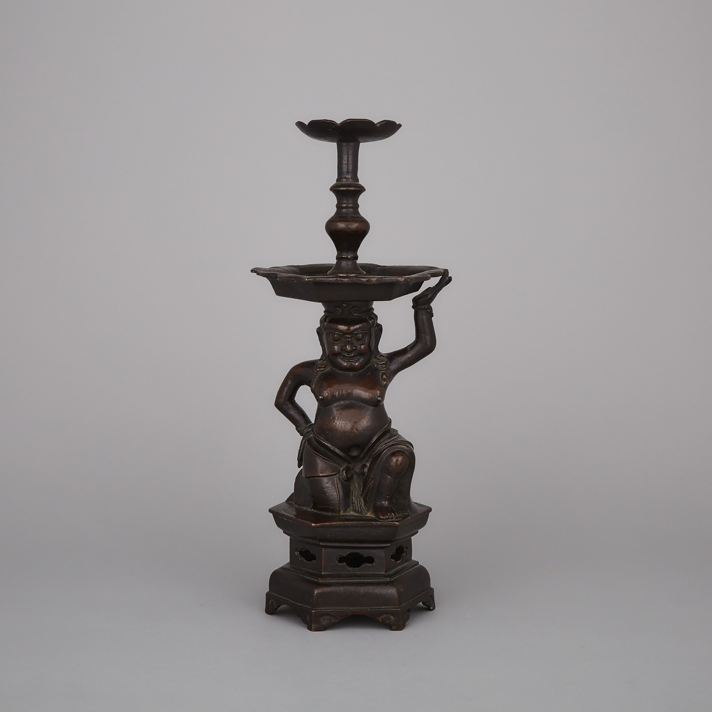 A Bronze ‘Foreigner’ Candlestick, Ming Dynasty