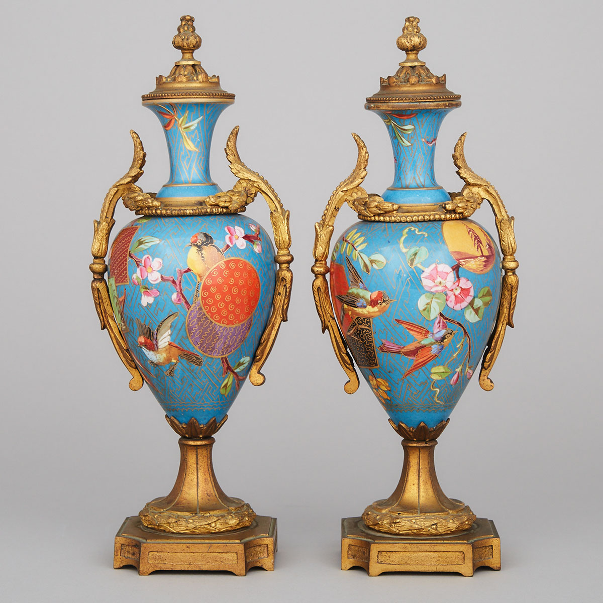 Pair of French Porcelain Ormolu Mounted Covered Vases, late 19th century