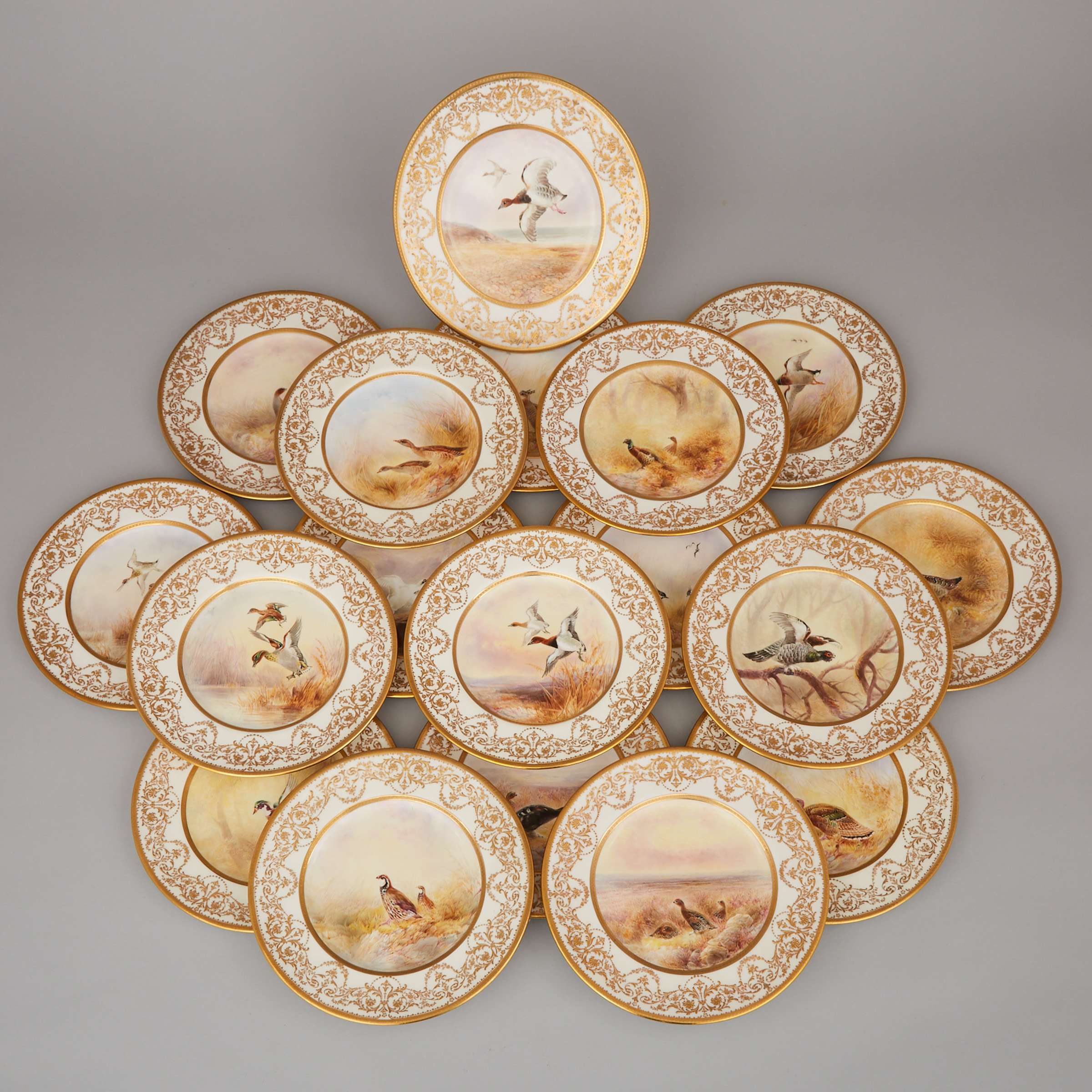 Set of Eighteen Royal Doulton Game Plates, Joseph Birbeck Sr., c.1918-22