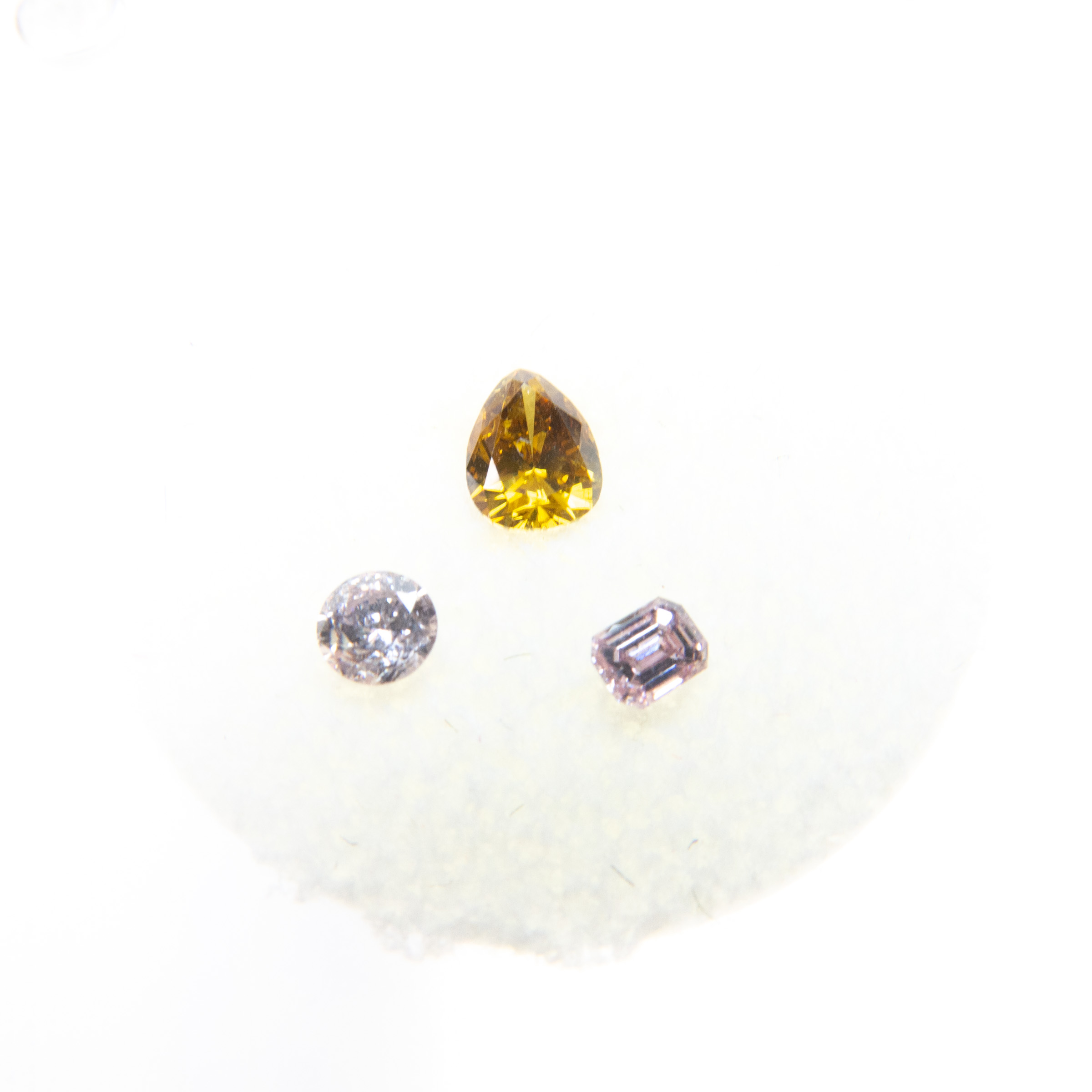 3 Unmounted Coloured Diamonds