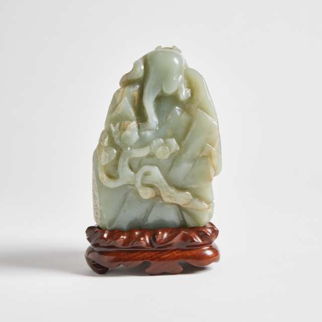 A Celadon Jade Carved 'Liu Hai and Toad' Boulder
