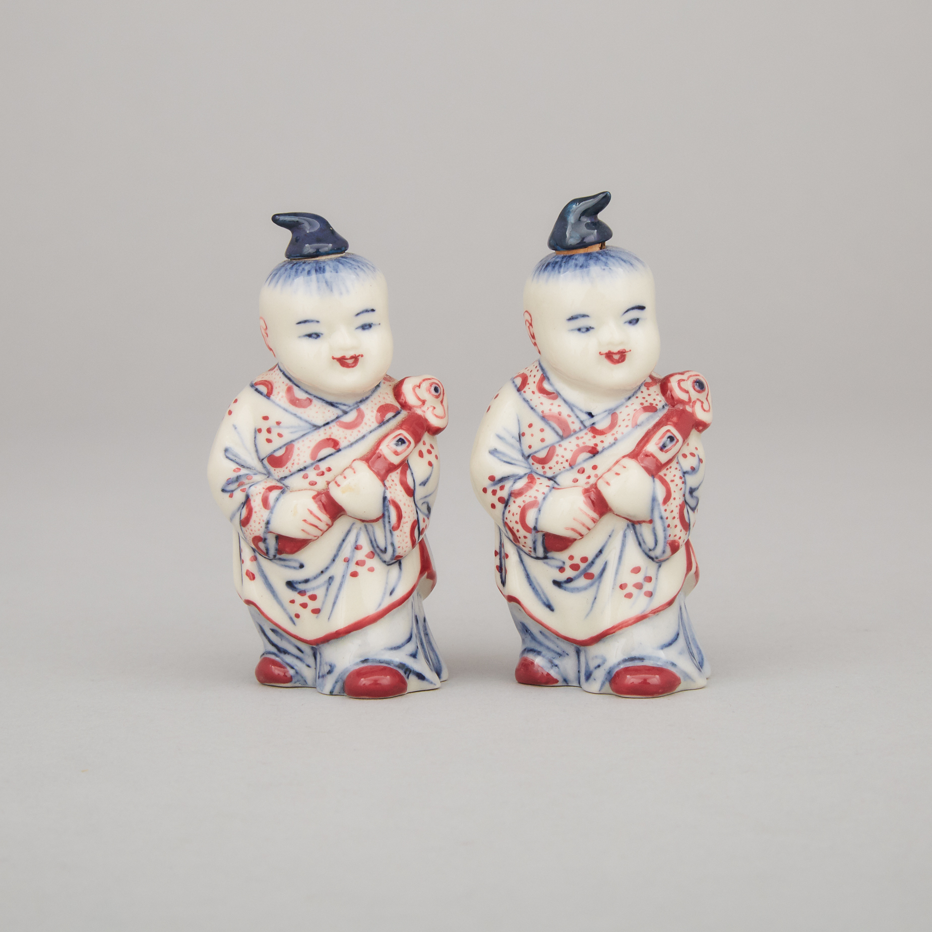 A Pair of Porcelain Figural Snuff Bottles, Daoguang Mark