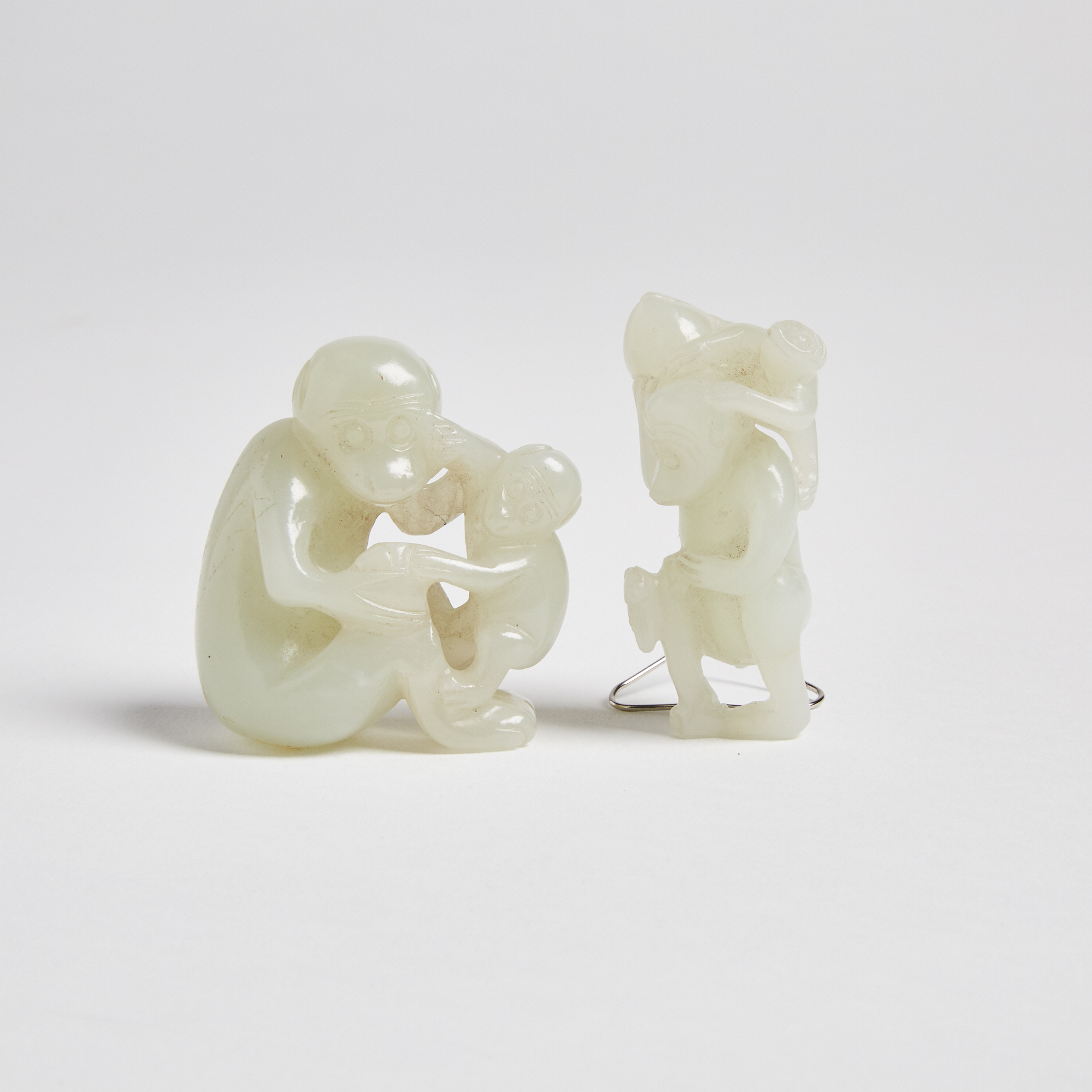 Two Celadon White Jade Carvings of Monkeys