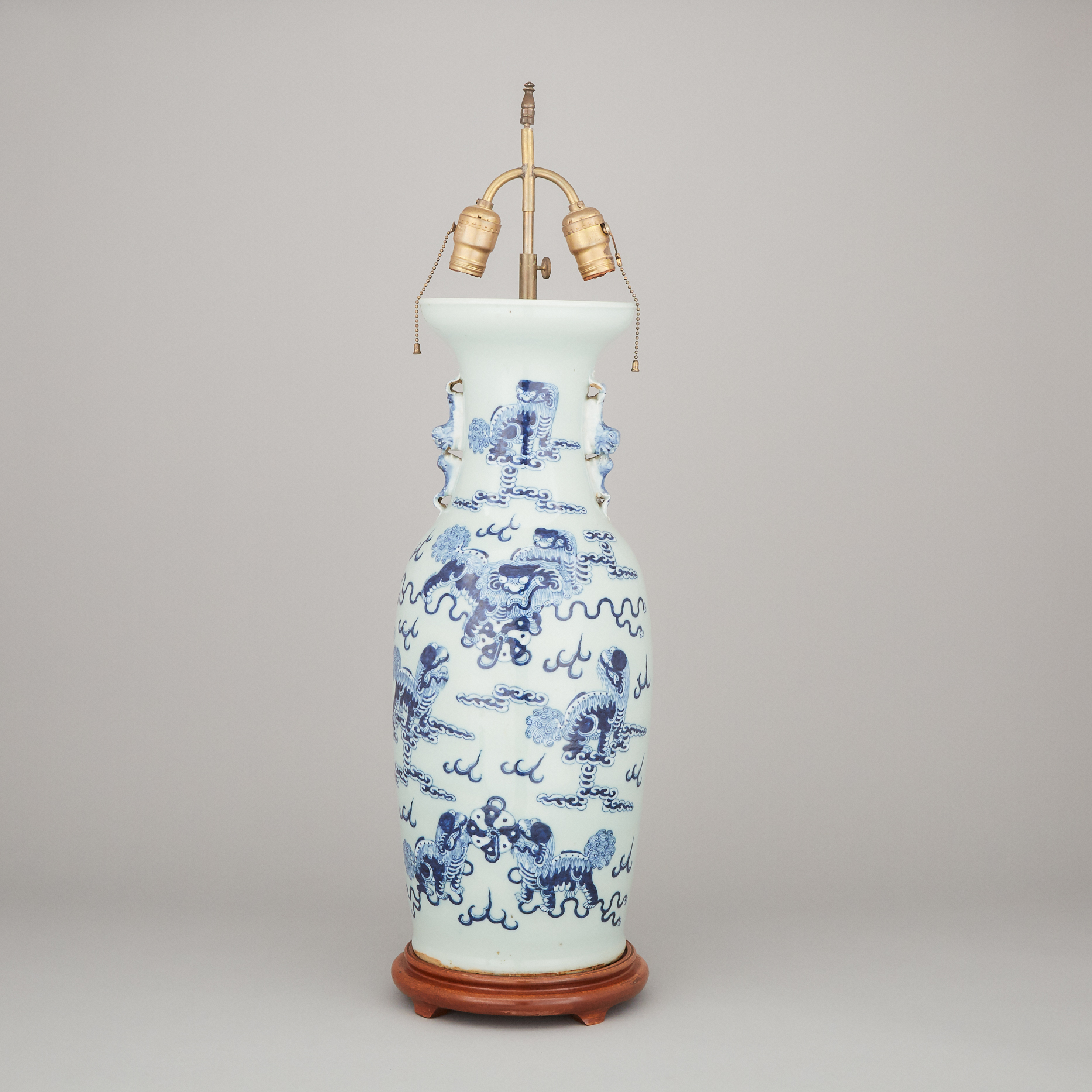 A Celadon Ground Blue and White Vase Lamp