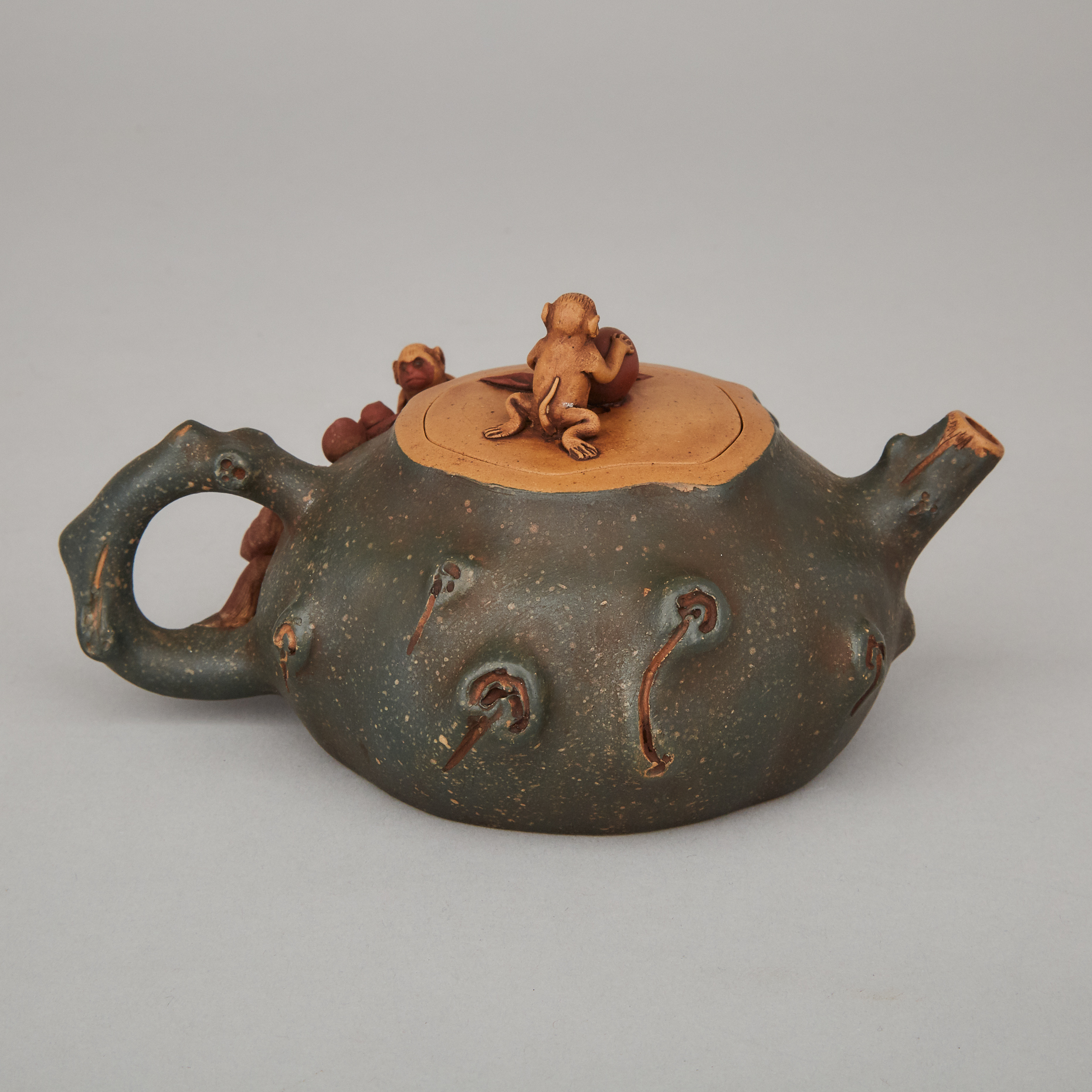 A Yixing Pottery 'Monkey and Peaches' Teapot, Jiang Yanting Mark 