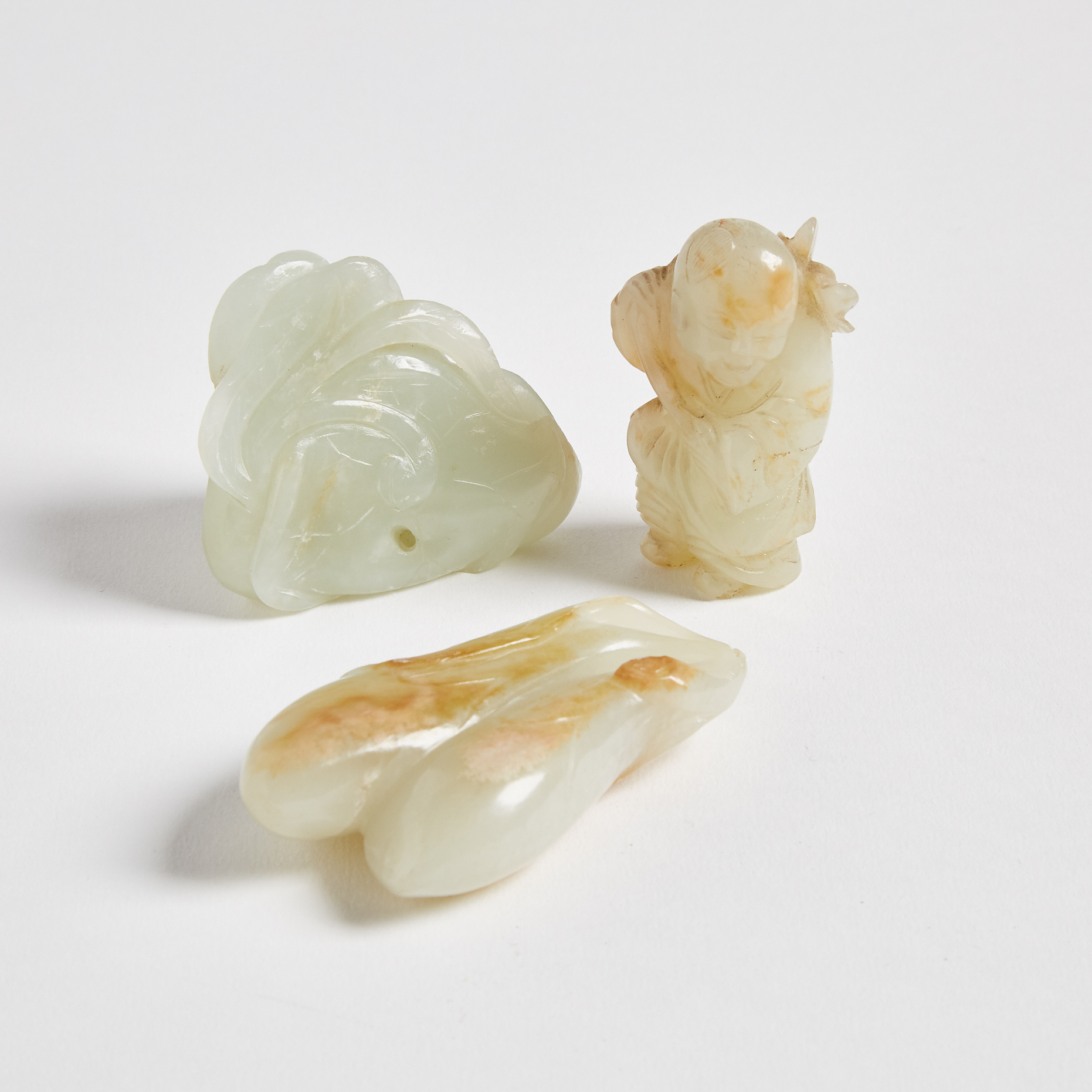 A Group of Three Jade Carvings 