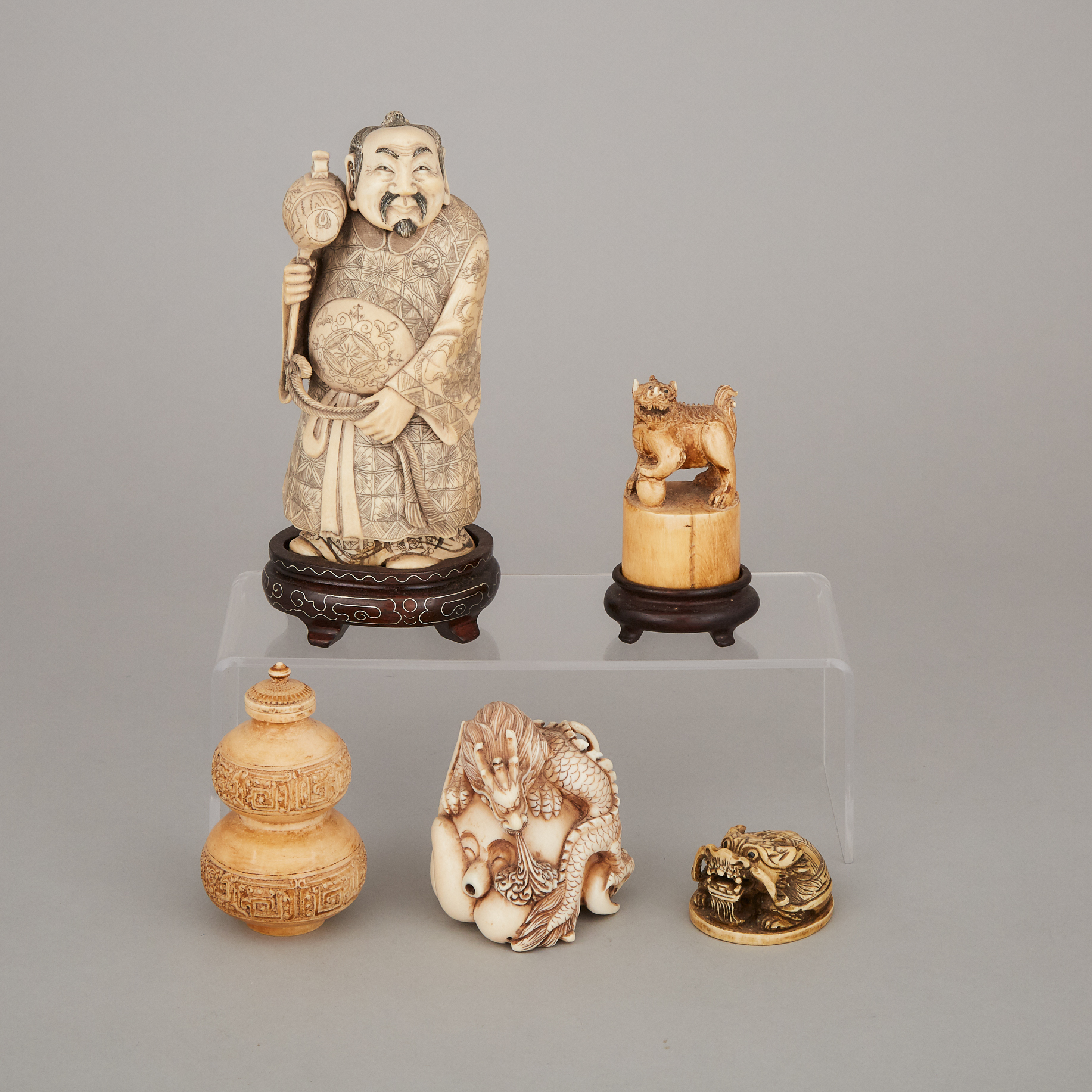 A Group of Five Ivory Carved Items, Early 20th Century