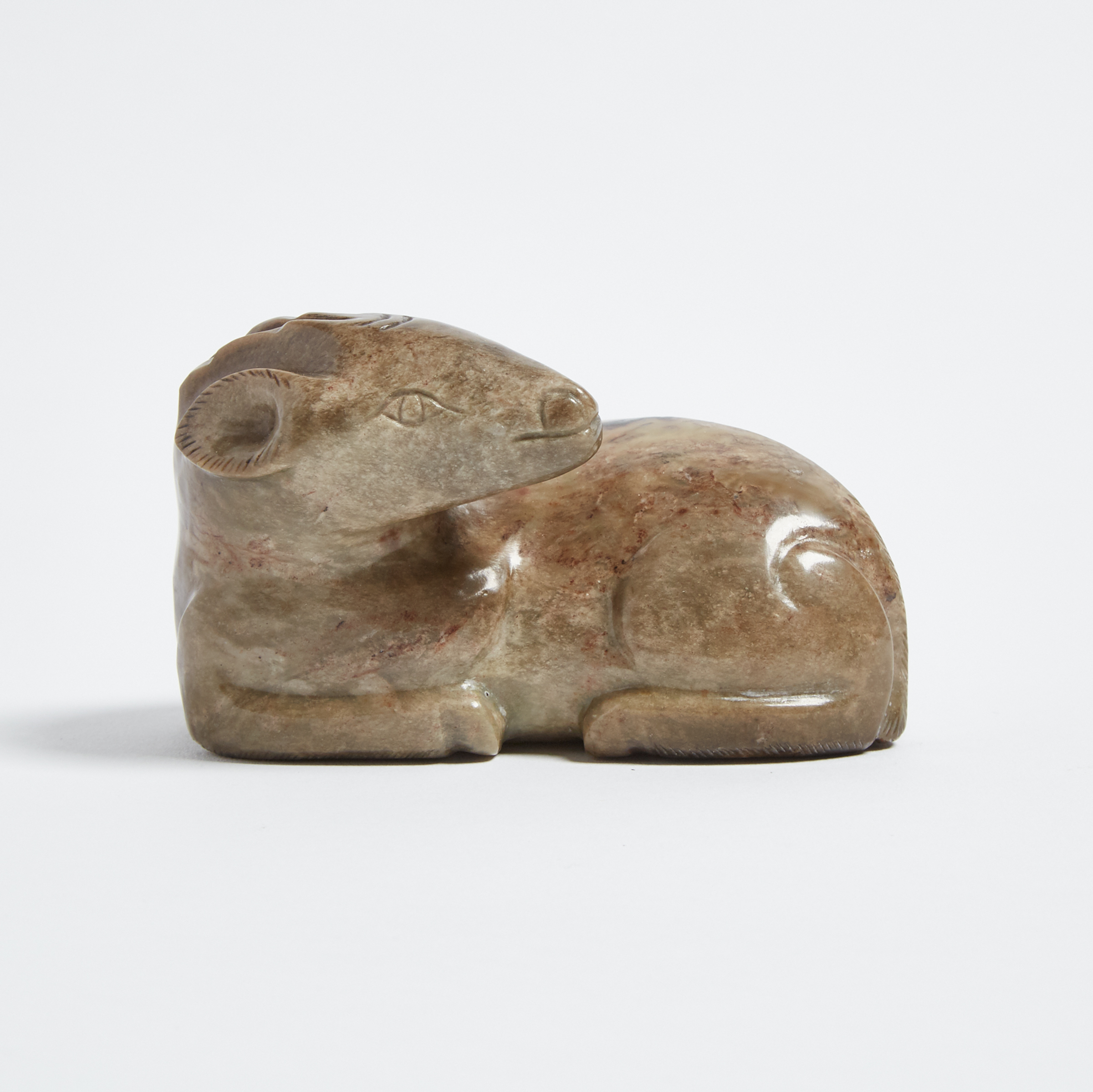 A Black And Russet Jade Carving of a Ram