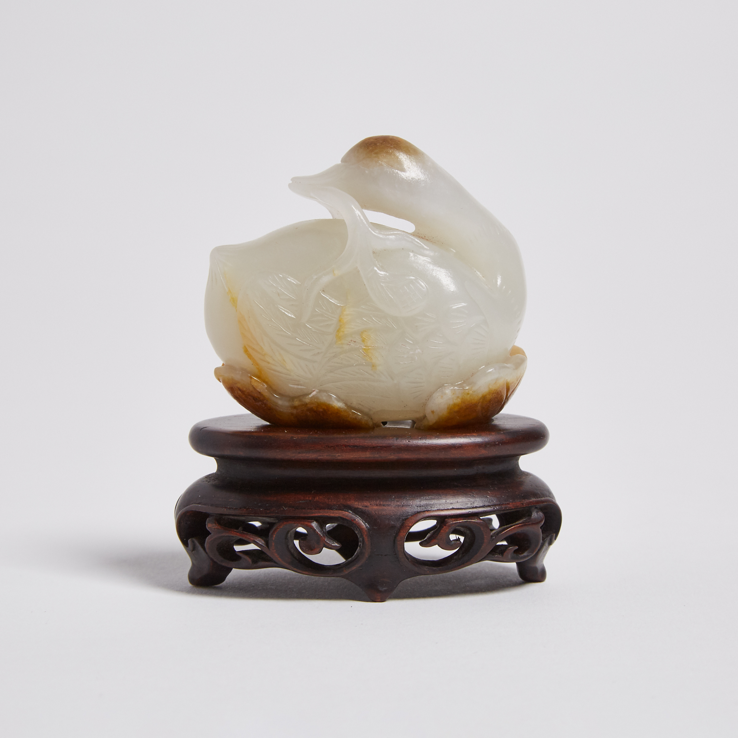 A White and Russet Jade Carved Duck