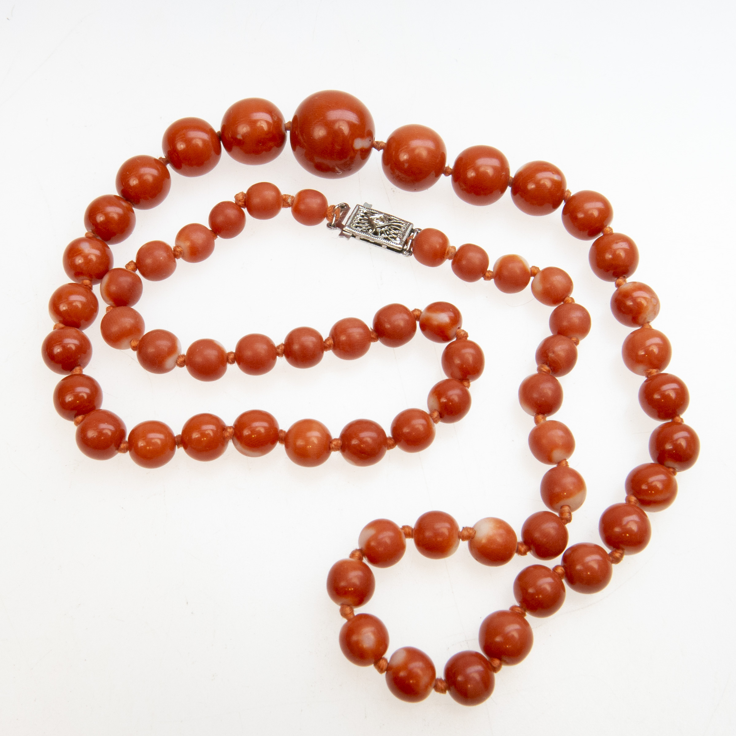 Single Graduated Strand Of Coral Beads