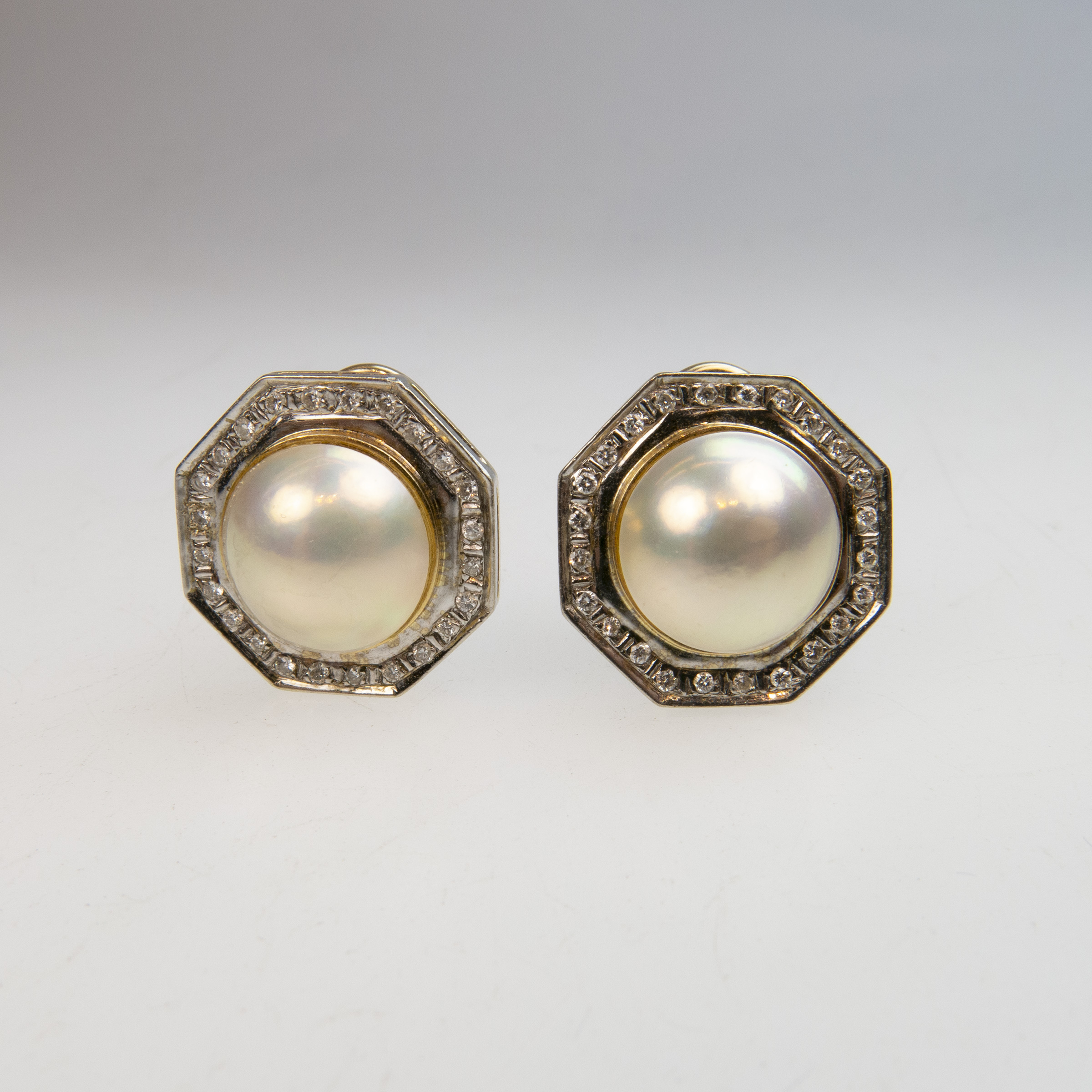 Pair of 14k Yellow and White Gold Button Earrings