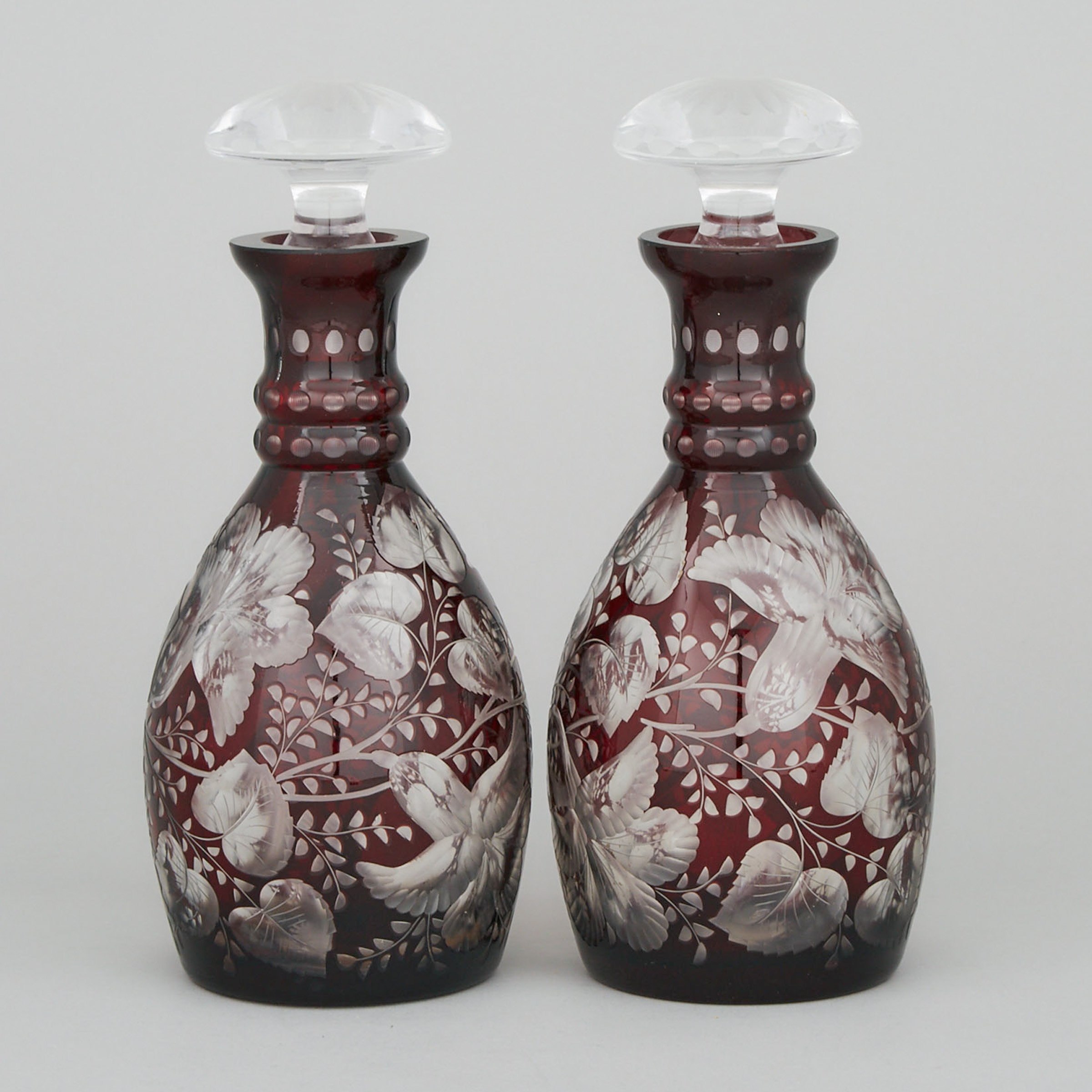 Pair of Bohemian Red Overlaid, Cut and Engraved Glass Decanters, 20th century