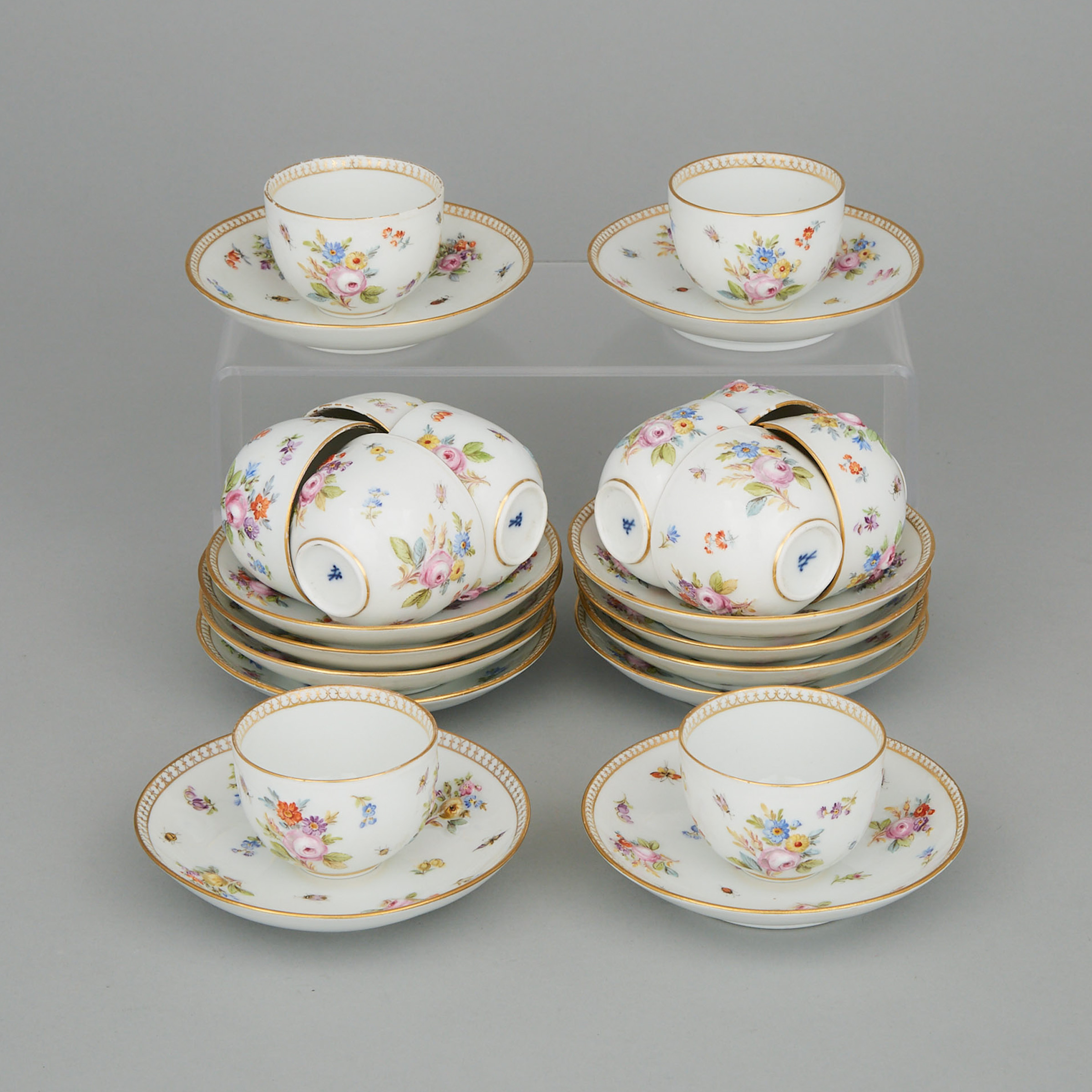 Twelve Meissen Moulded Floral Cups and Saucers, early 20th century
