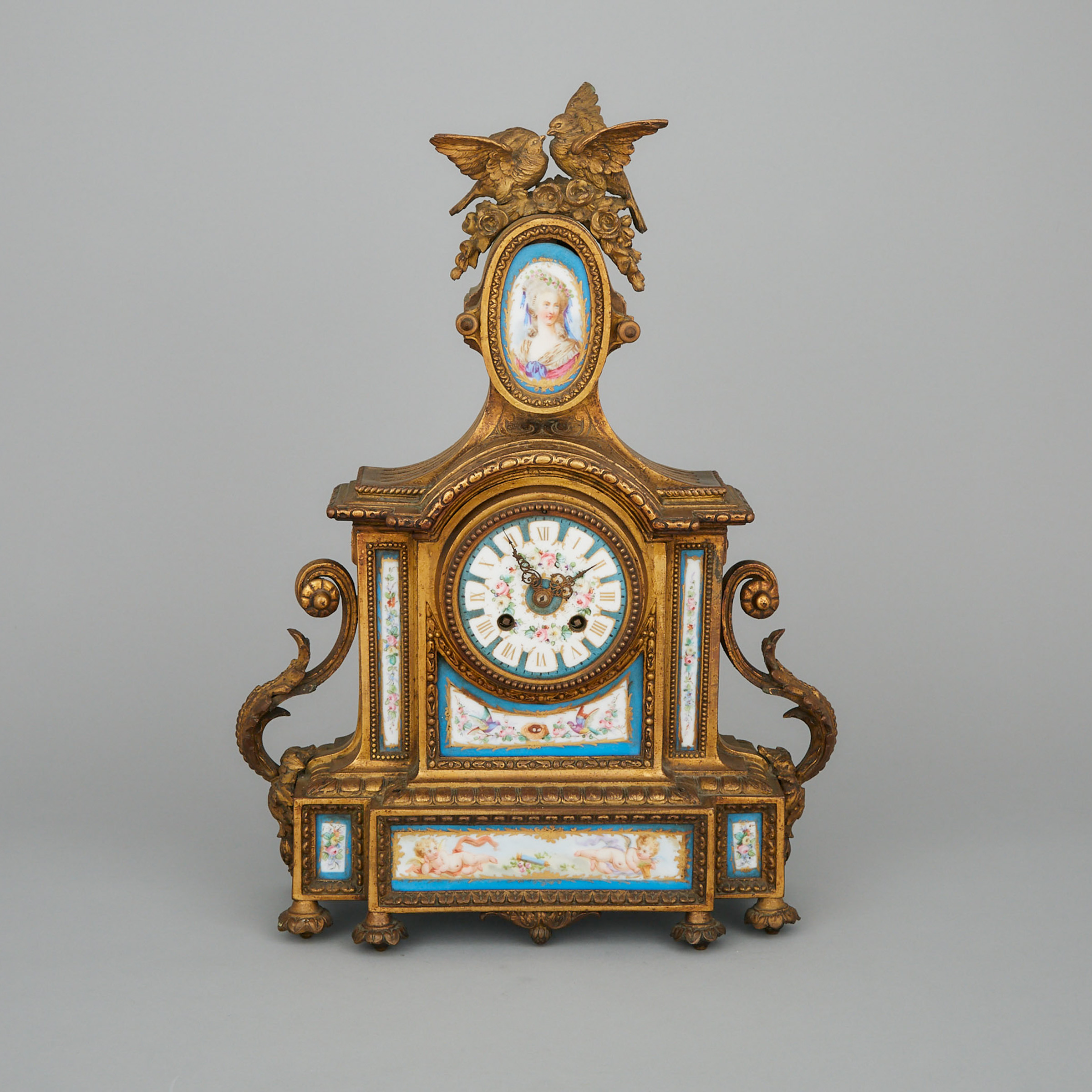 Louis XVI Style Sevres Style Porcelain Mounted Gilt White Metal Mantel Clock, 19th century