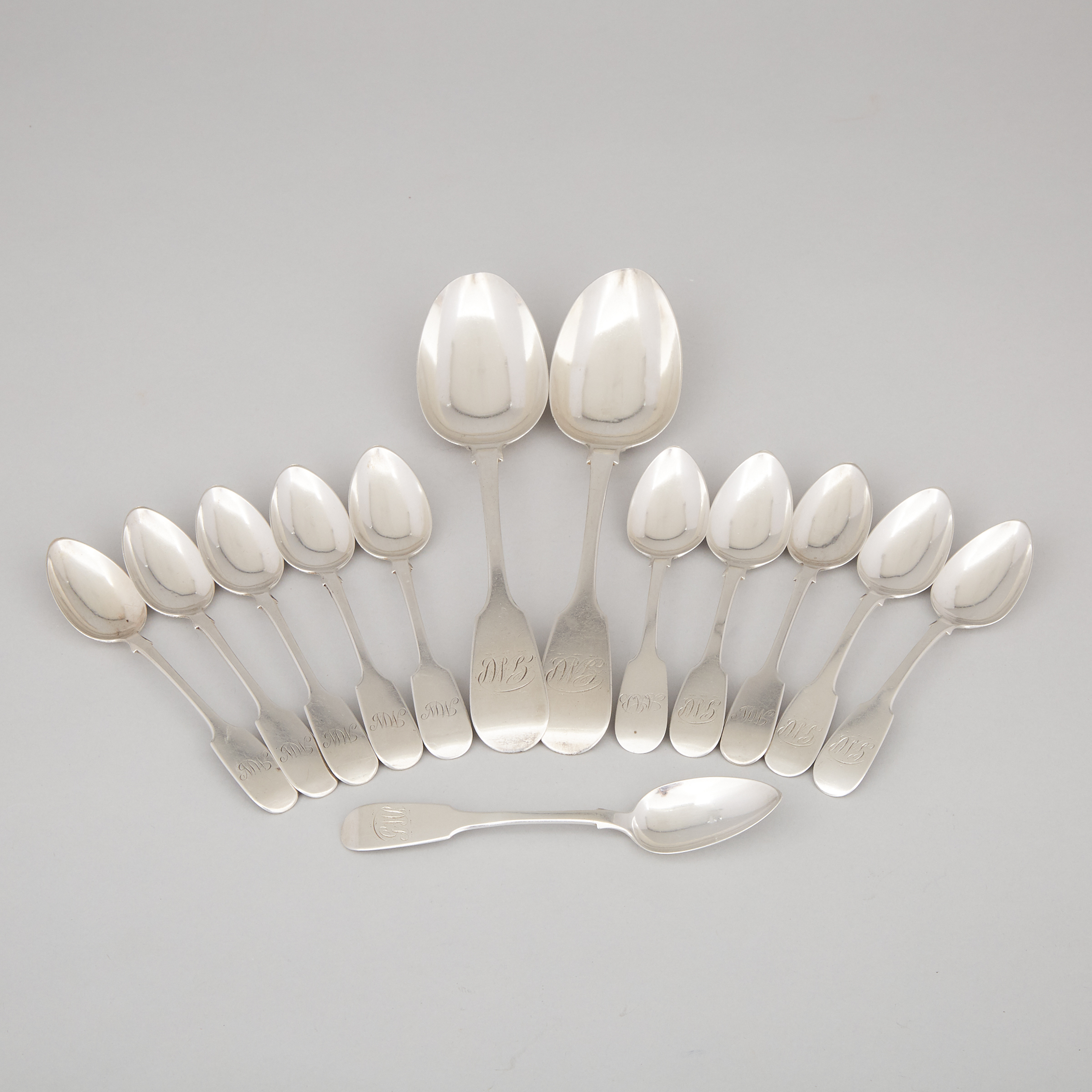 Two Canadian Silver Fiddle Pattern Table Spoons and Eleven Tea Spoons, Richard Kestell Oliver, Toronto, Ont., c.1843-60