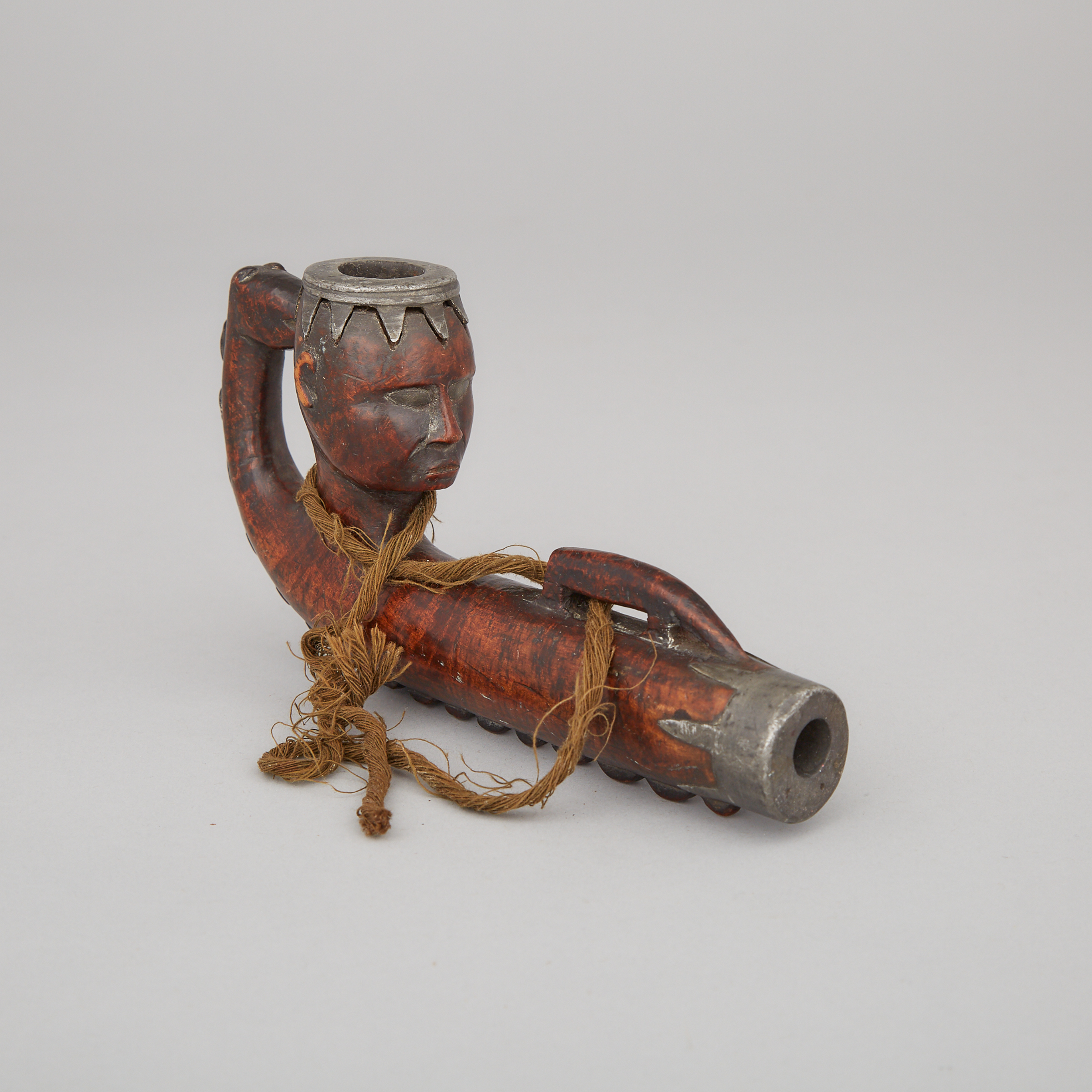 Great Lakes/Eastern Woodlands Pewter Inlaid Carved Elm Ceremonial Pipe, 18th/early 19th century