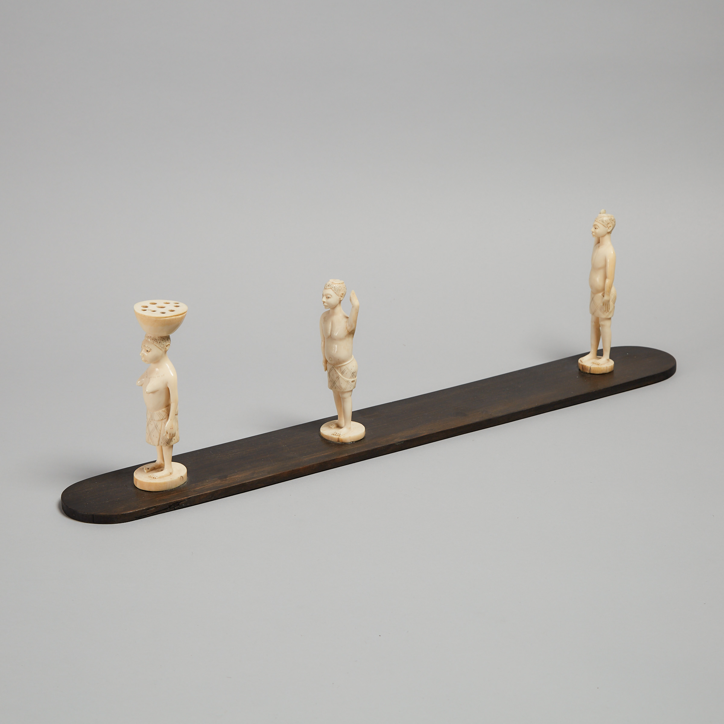 West African Carved Ivory Figural Procession, possibly Yoruba