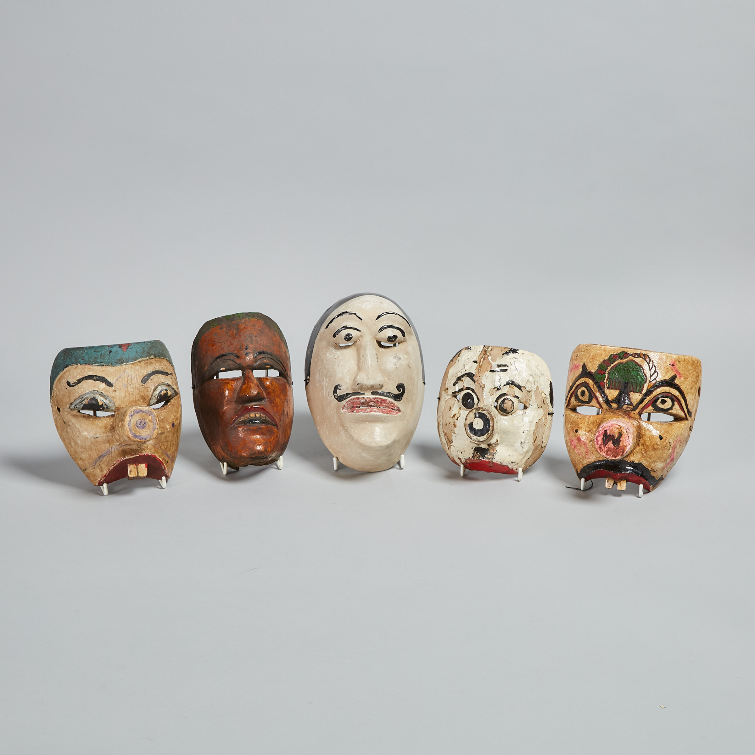 Five Carved and Painted Wood Half Masks, Java, Indonesia 