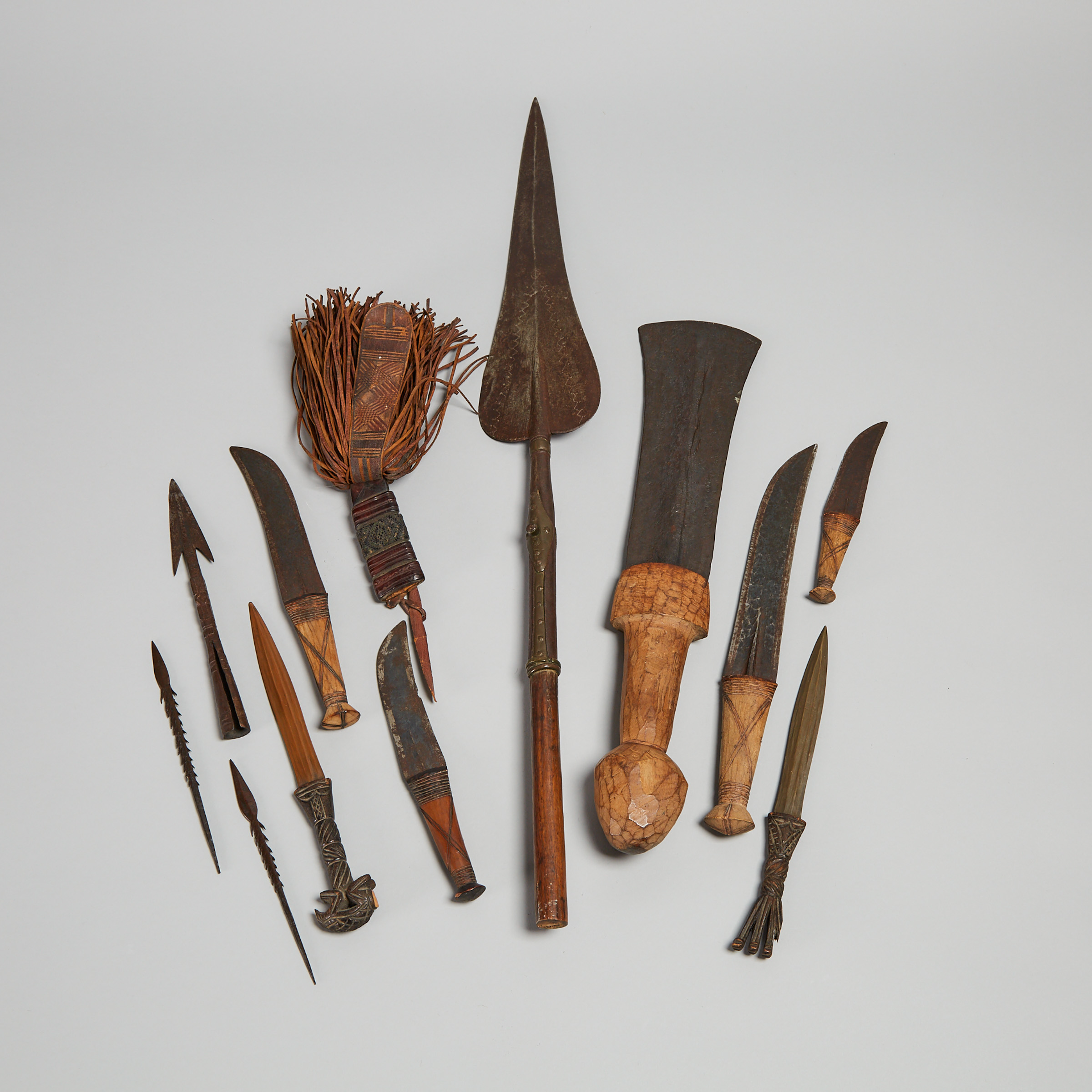 A Group of 11 African Edged Weapons