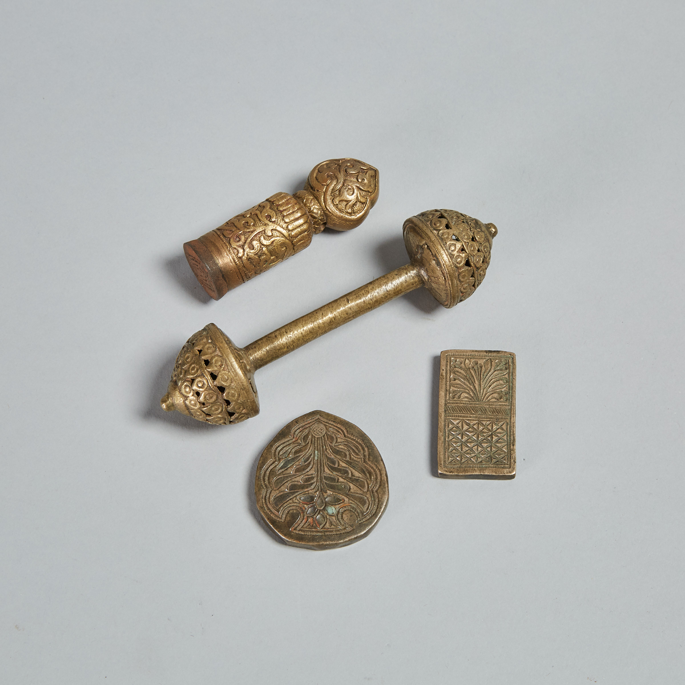 Three Brass Stamps and a rattle, India