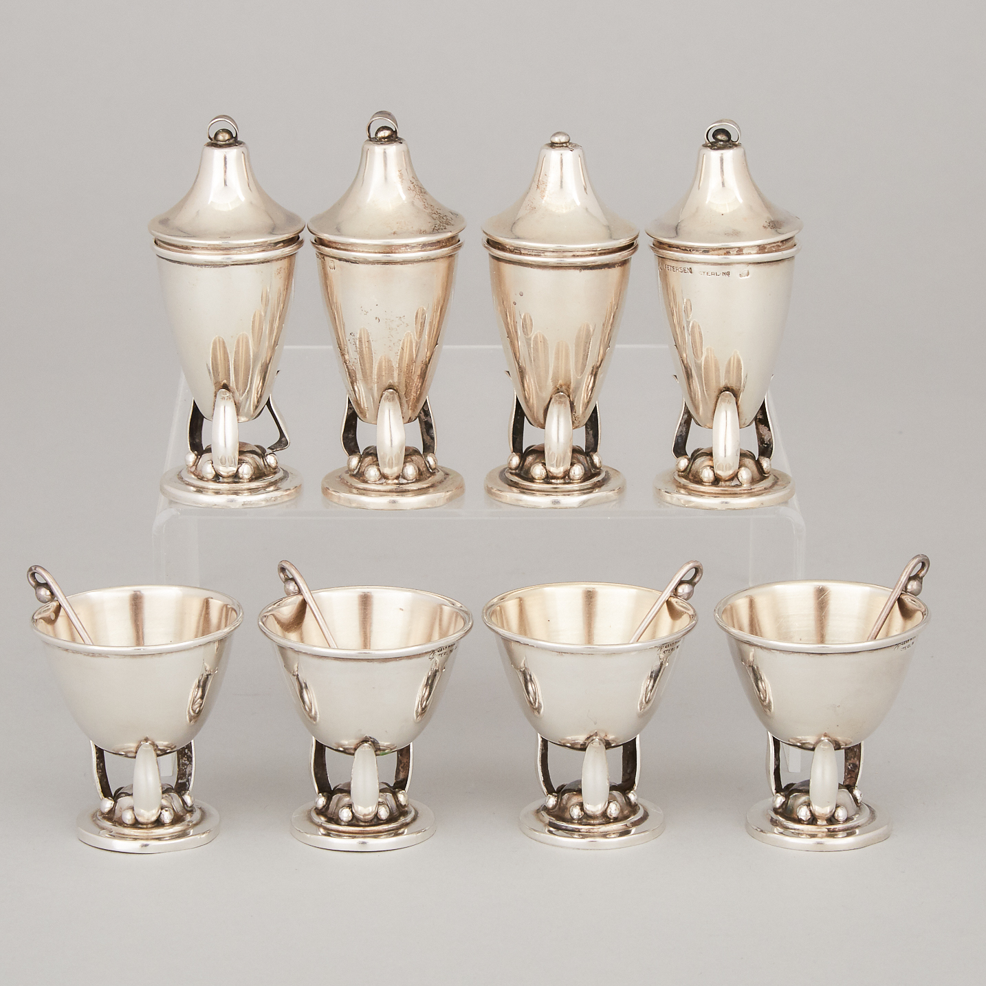 Four Canadian Silver Pepper Casters and Four Salt Cellars with Spoons, Carl Poul Petersen, Montreal, Que., mid-20th century