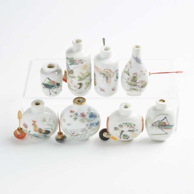 A Group of Eight Enameled Porcelain Snuff Bottles, 19th/20th Century
