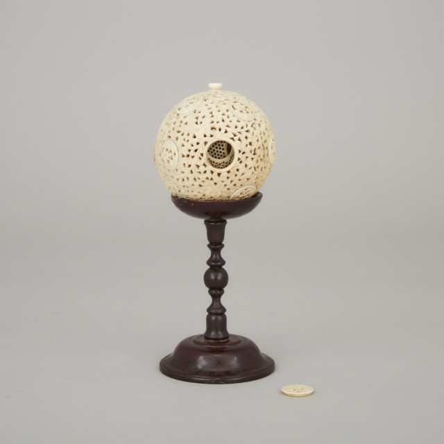 A Chinese Pierced Ivory Puzzle Ball, 18th/19th Century