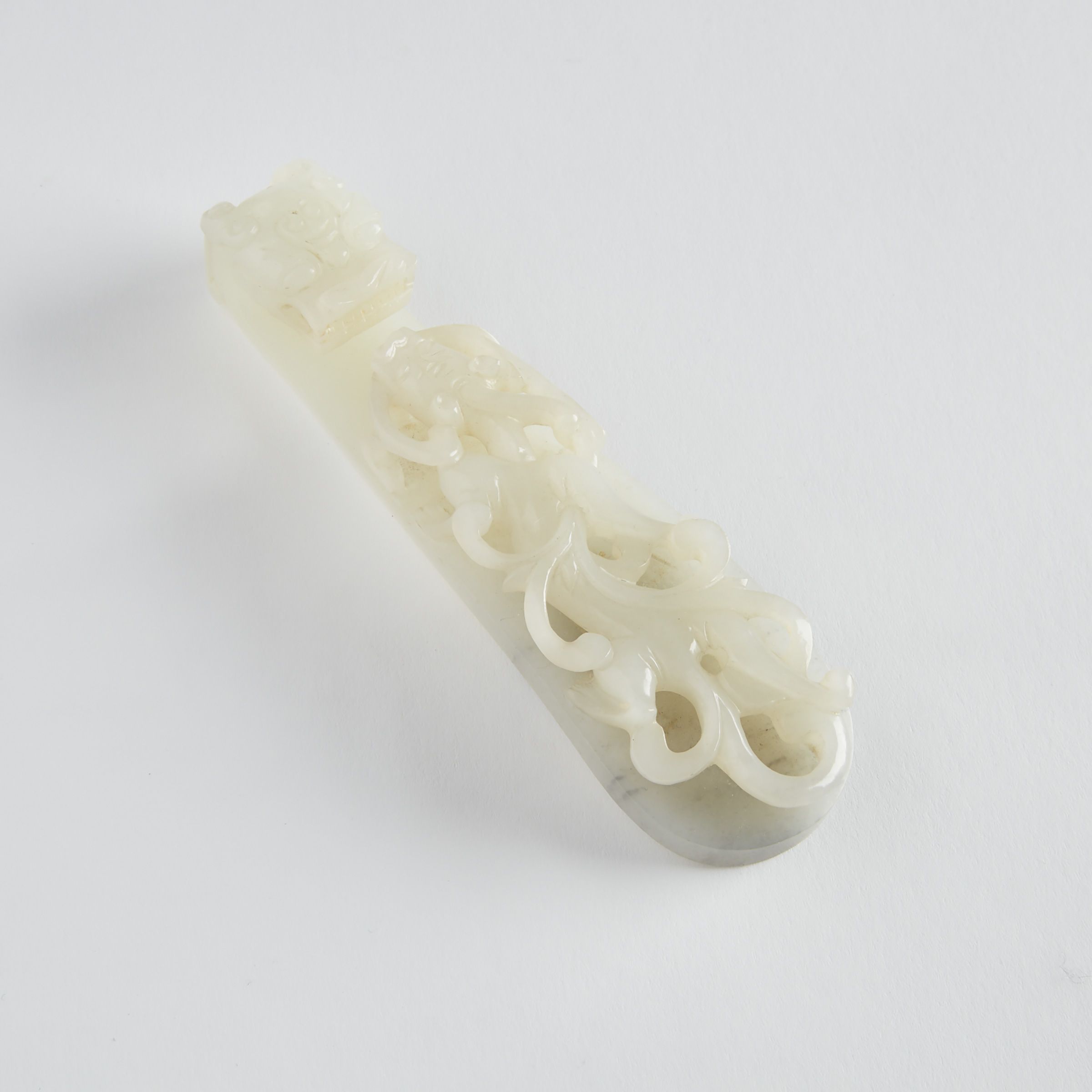 A Wide Celadon White Jade Carved Belt Hook