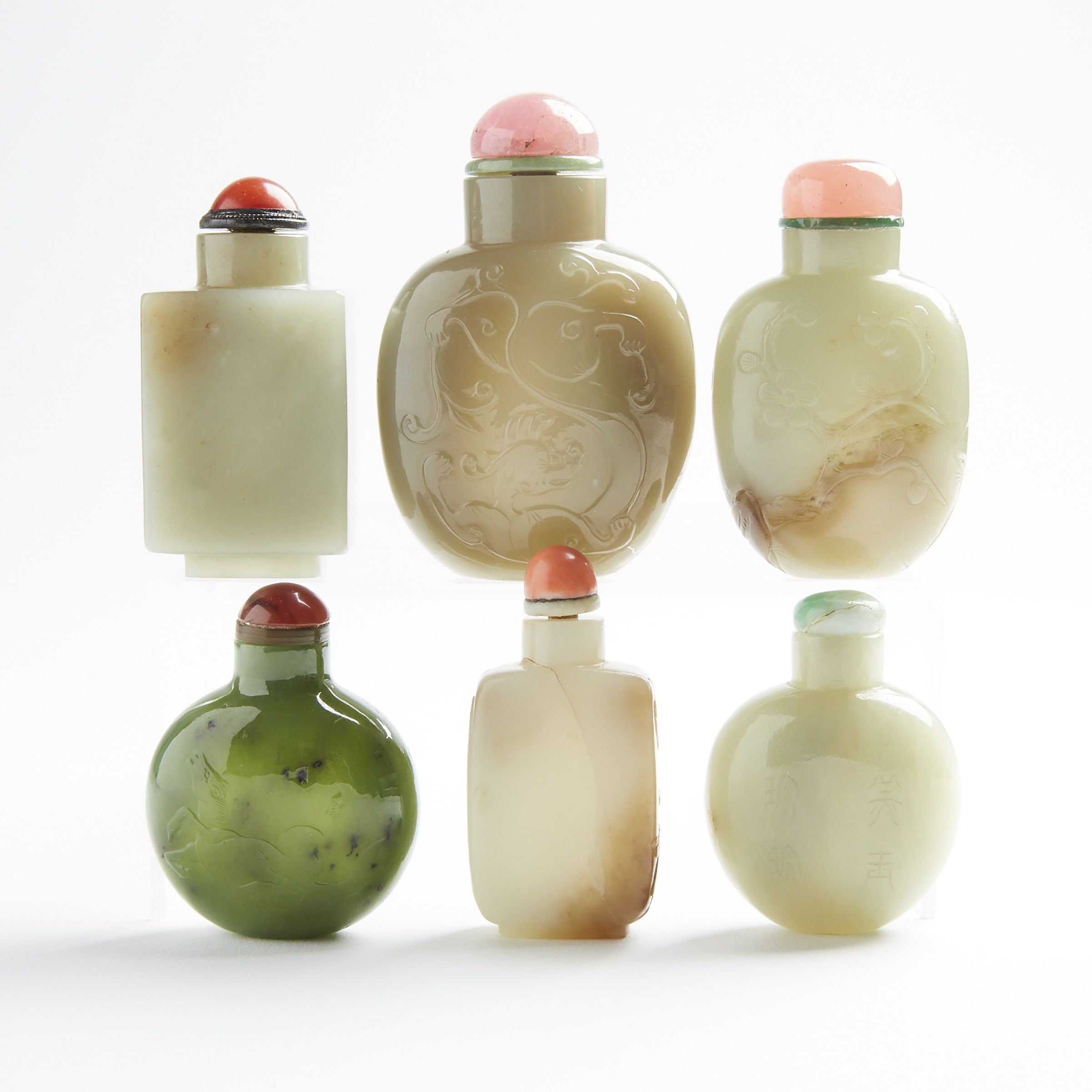A Group of Six Jade Snuff Bottles, 19th/20th Century
