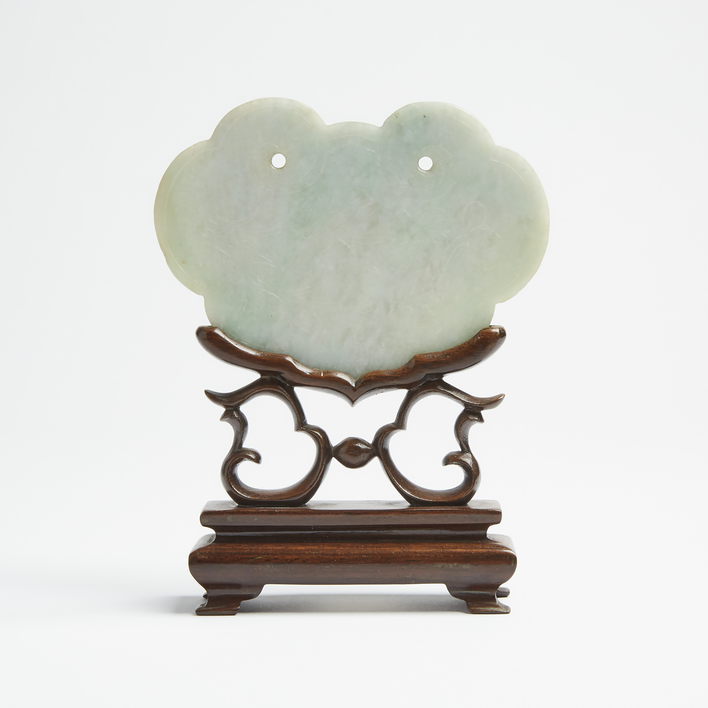 A Jadeite Ruyi Head-Shaped Plaque with Stand, Late Qing Dynasty