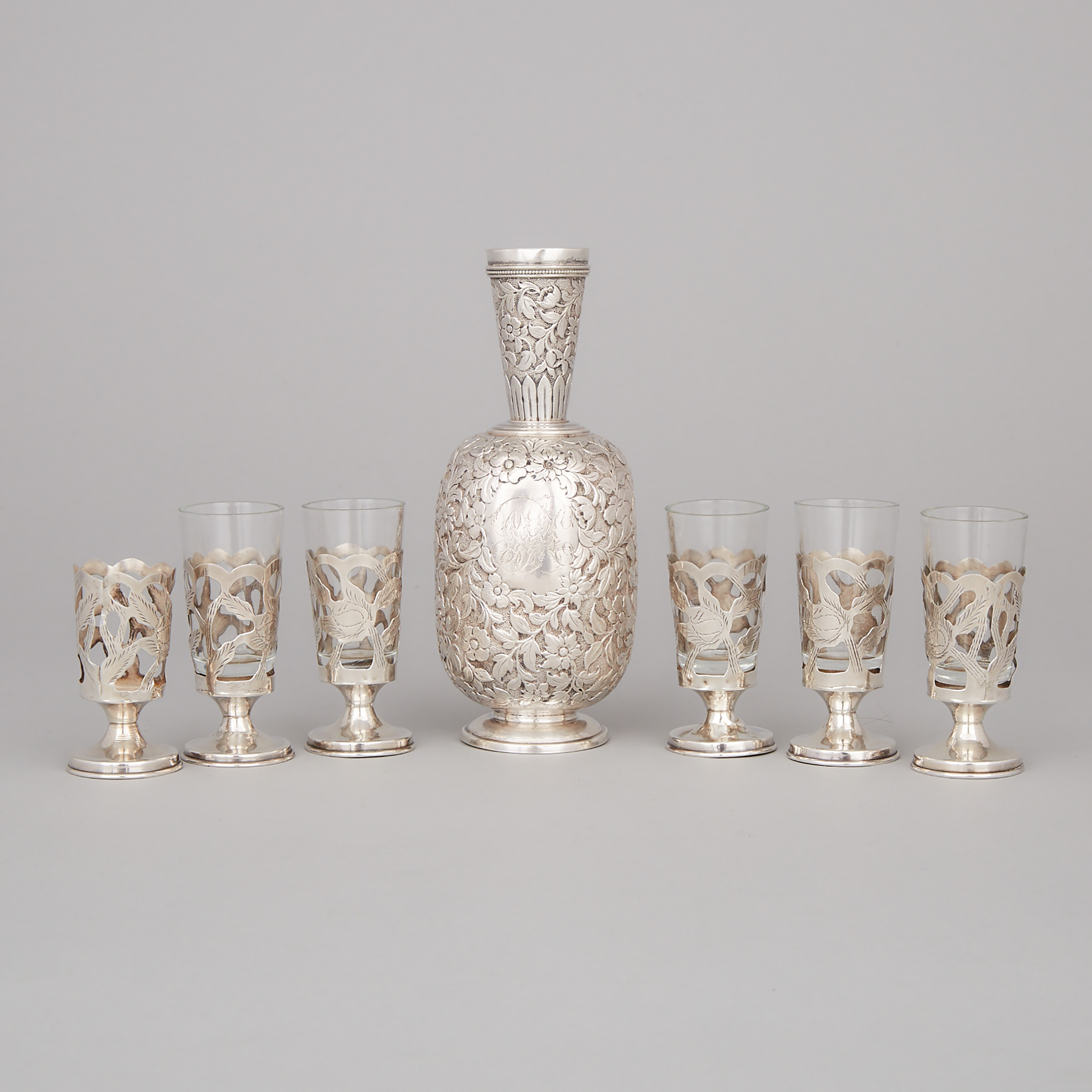 American Silver Repoussé Vase, probably Bigelow, Kennard & Co., Boston, Mass., late 19th century, together with Six Mexican Silver Liqueur Glass Frames, Taxco, 20th century