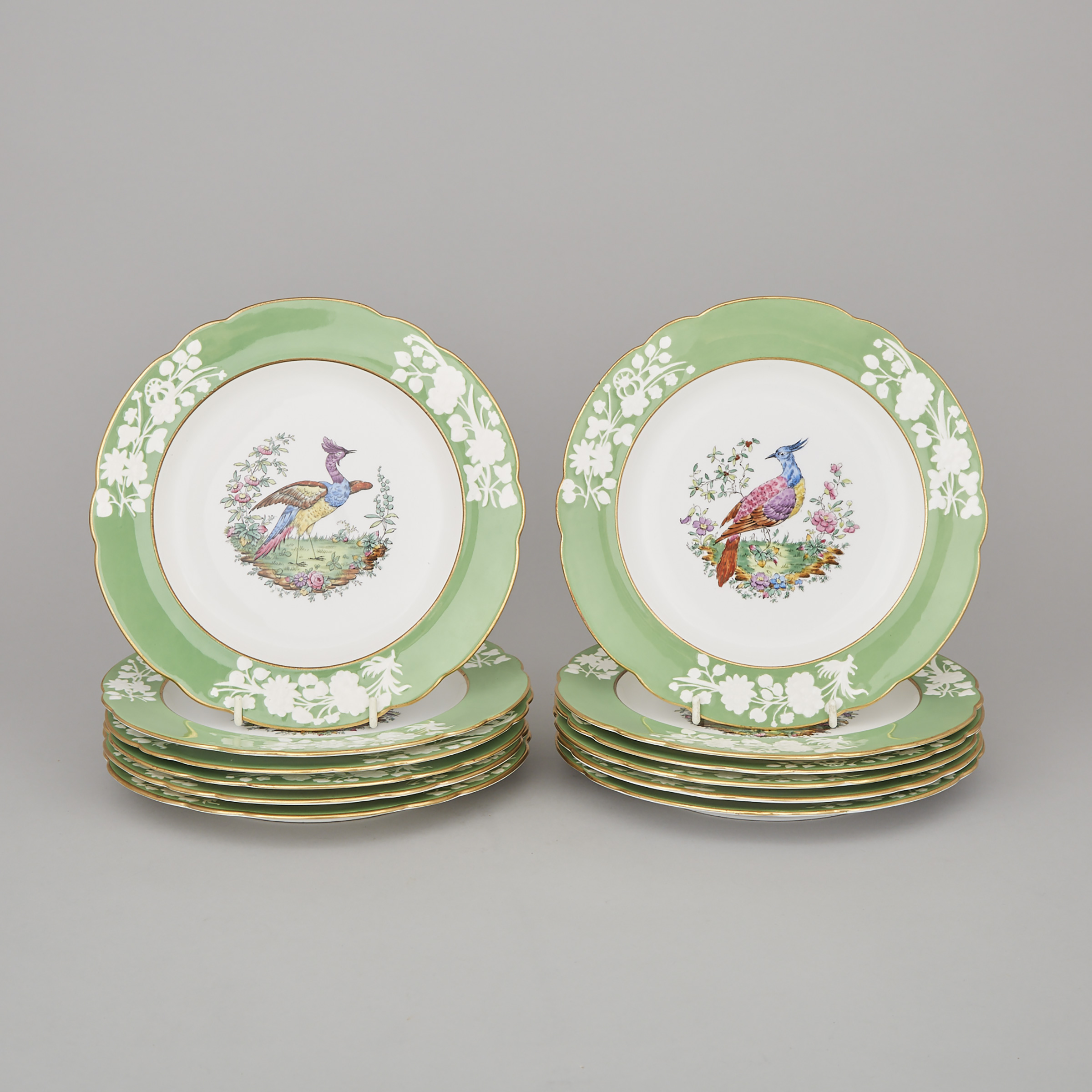 Twelve Copeland Spode Apple Green Banded 'Liverpool Birds' Plates, early 20th century