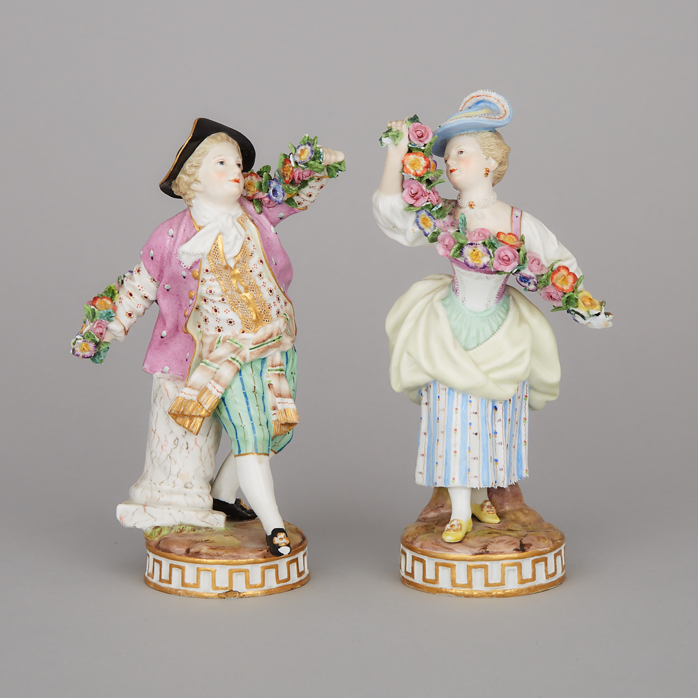 Pair of Meissen Floral Garland Figures, late 19th century