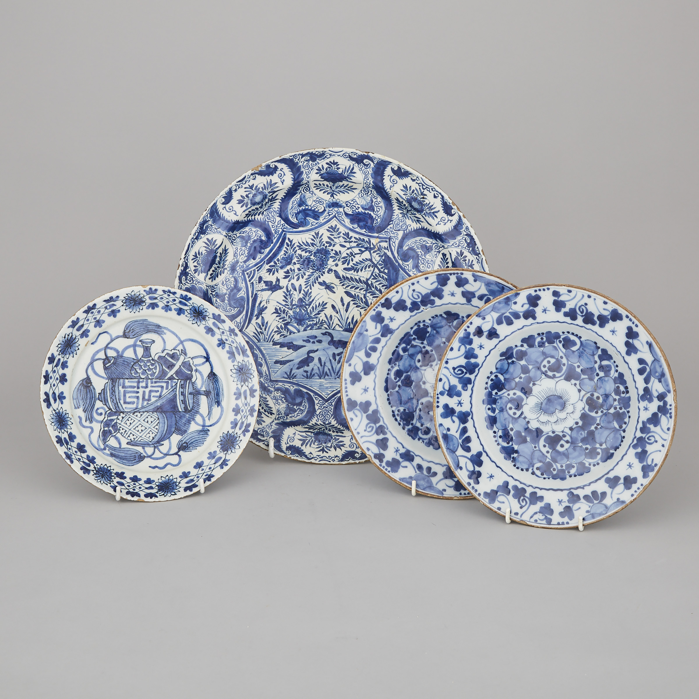 Dutch Delft Blue and White Charger, De Porceleyne Klaeuw, and Three Plates, second half of the 18th century