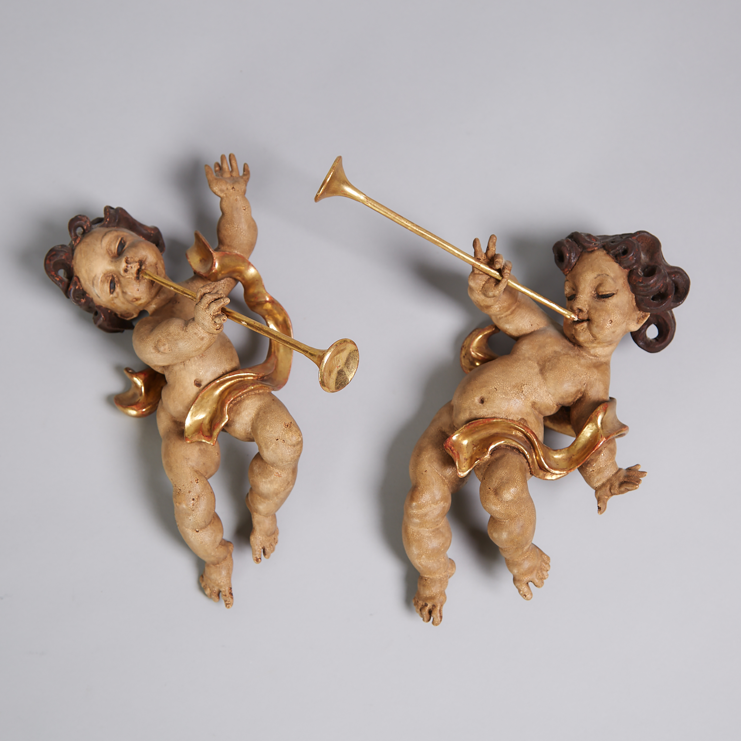 Pair of Italian Carved, Polycromed and Parcel GIlt Cherub Figures, mid 20th century