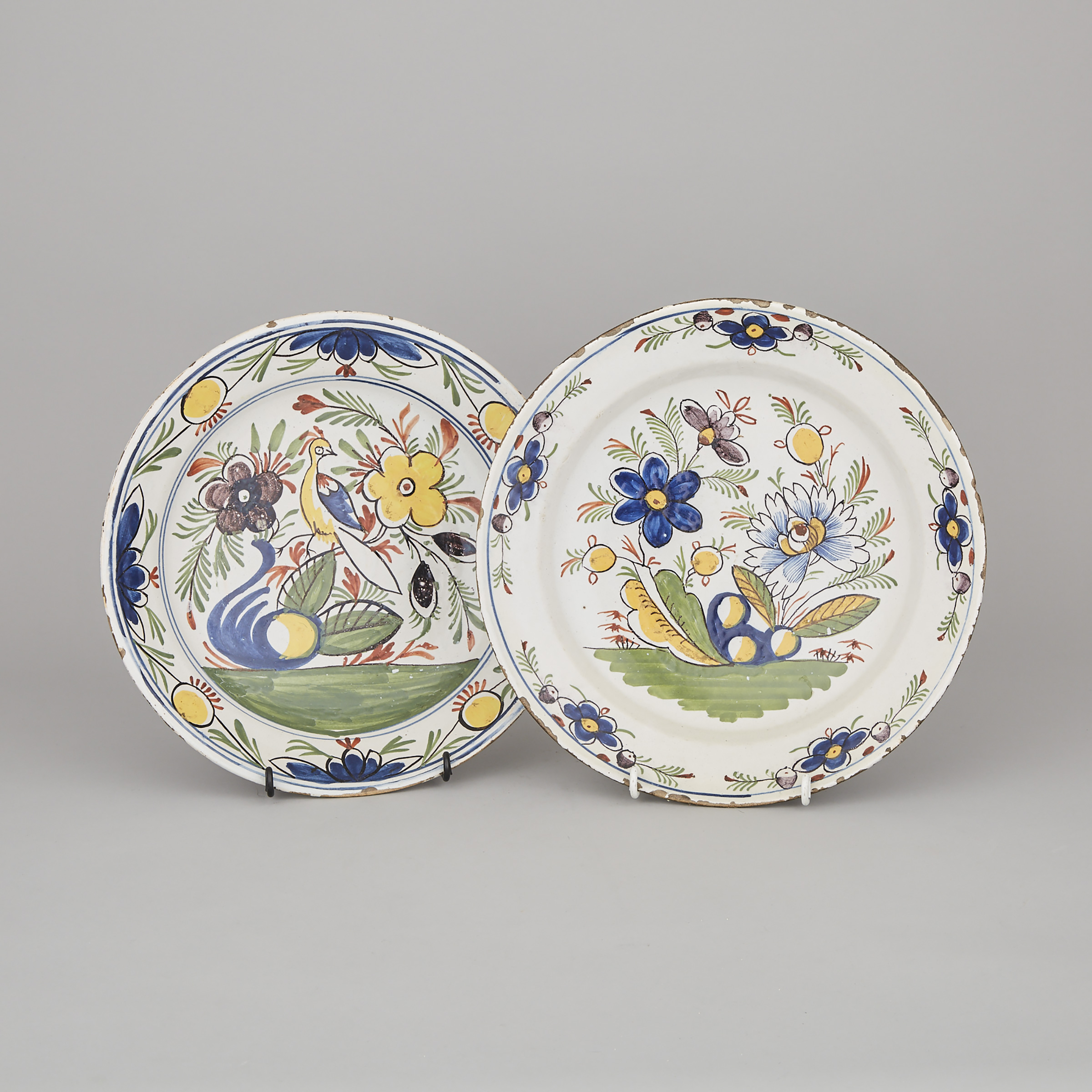 Two Continental Faience Polychrome Chargers, probably Spanish, 18th/19th century