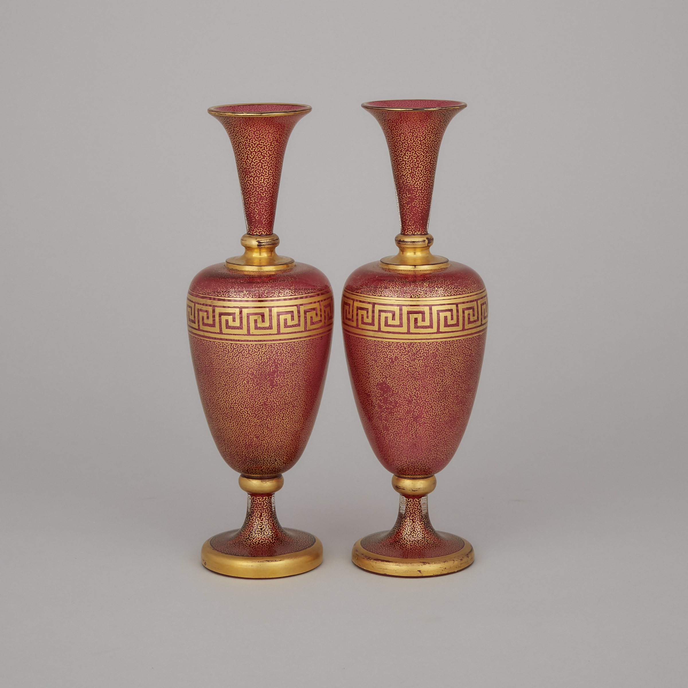 Pair of Bohemian Gilt Decorated Red Glass Vases, late 19th century