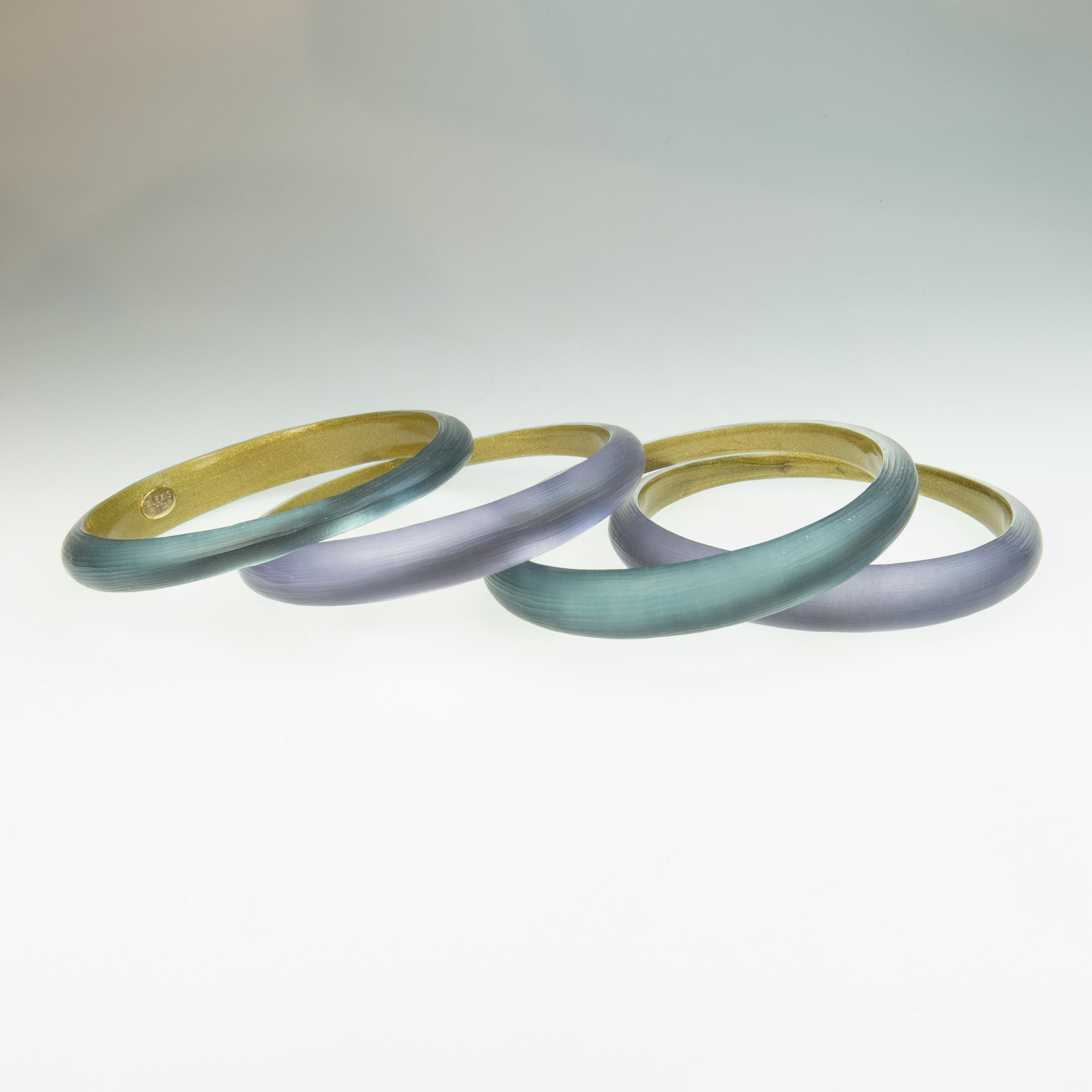 Four Alexis Bittar Carved Various Colour Lucite Bangles