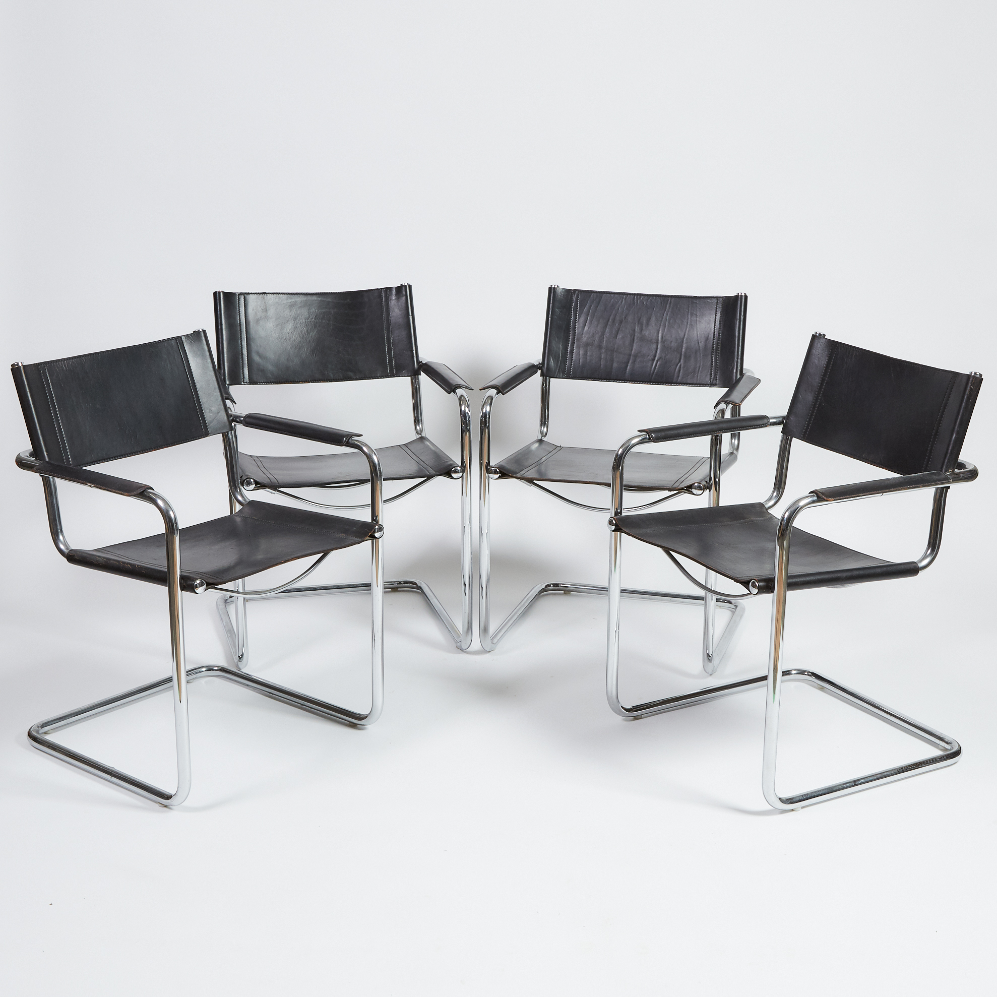 Set of Four Contemporary Chrome and Leather Arm Chairs, c.1984
