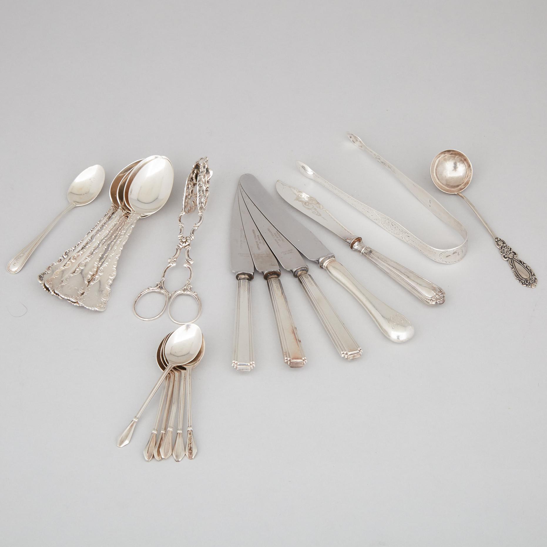 Group of English and North American Silver Flatware Including a Pair of Sugar Tongs by Hester Bateman, London, 1784-85