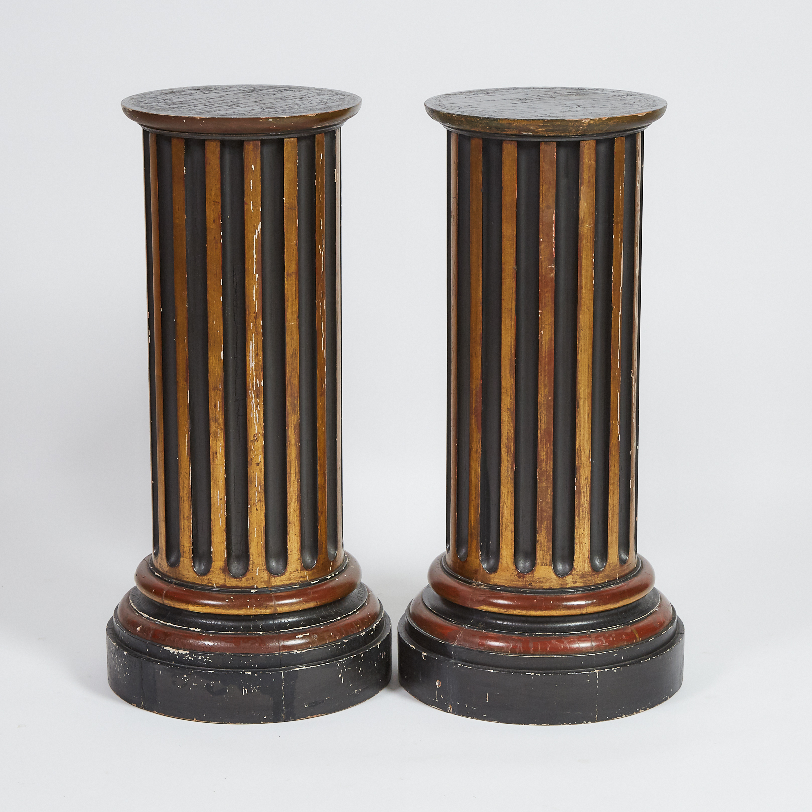 Pair of Parcel Gilt and Ebonized Fluted Column Form Pedestals, c.1900