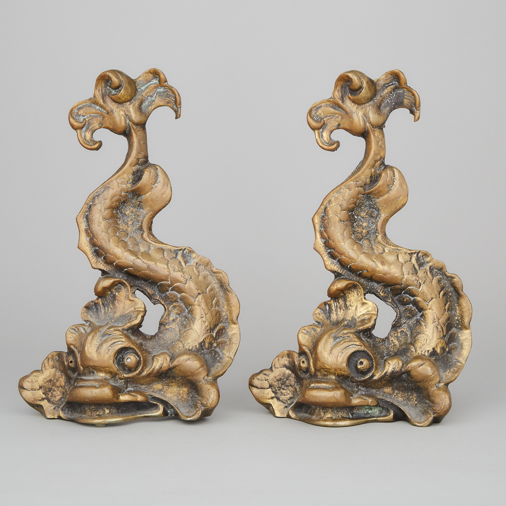 Pair of English Gilt Brass Dolphin Form Doorstops, early 20th century