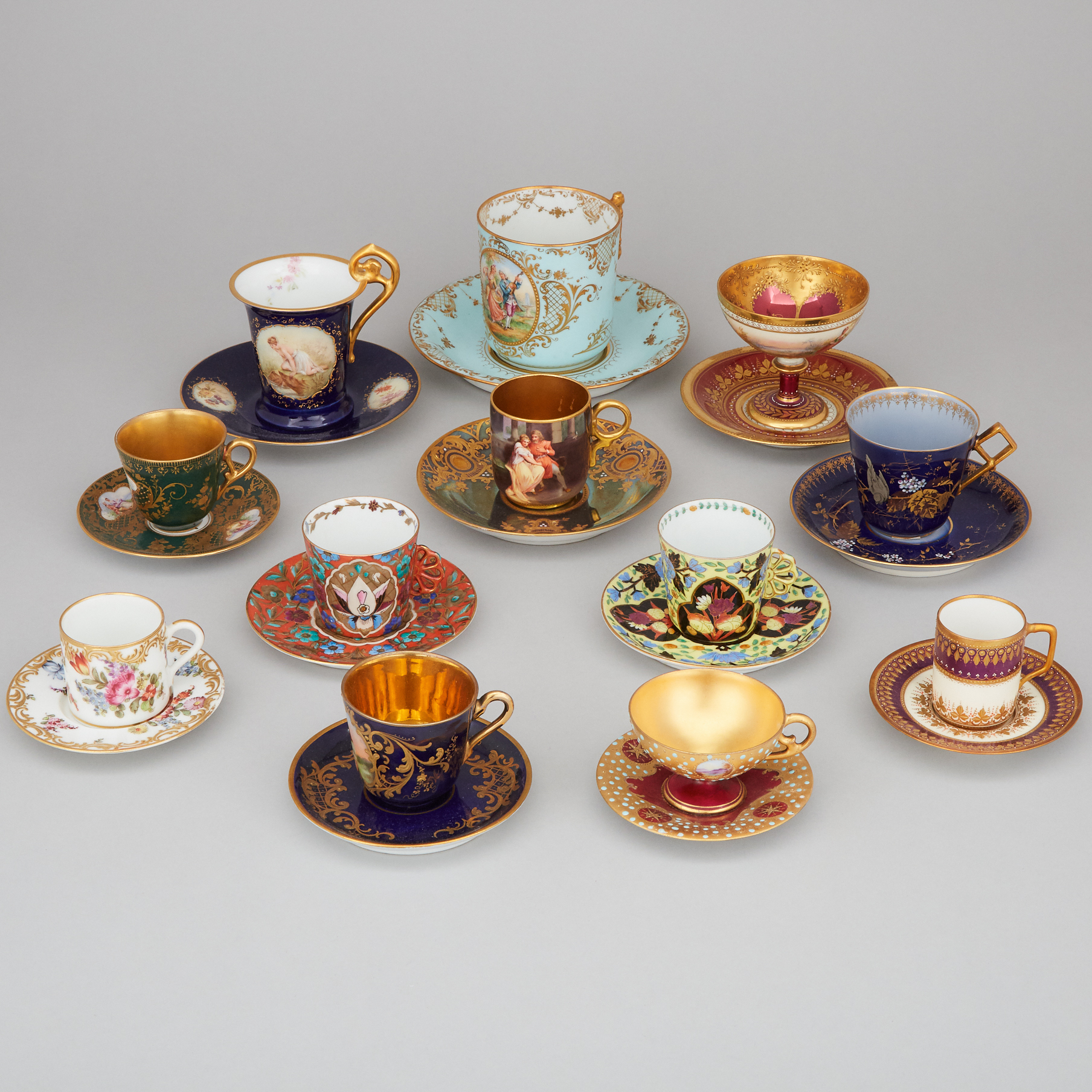 Twelve Various 'Vienna', Dresden, Berlin, Rosenthal and Other German Porcelain Cups and Saucers, early 20th century